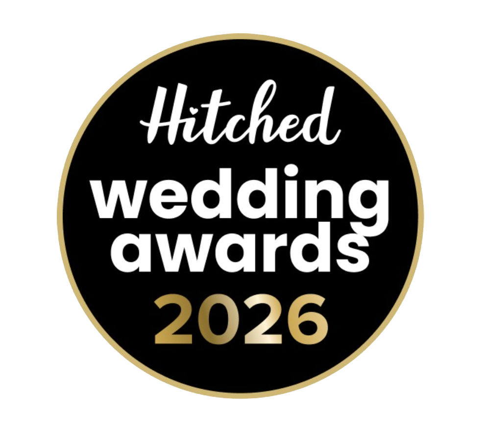 Collection of black and gold wedding industry award badges and accolades.