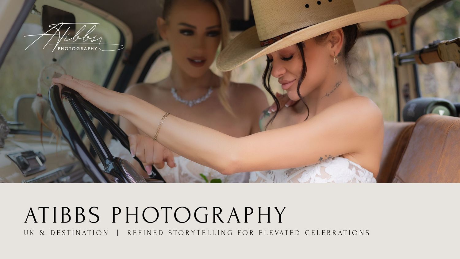 Two people sit in a vintage car wearing elegant white attire during a special celebration event.