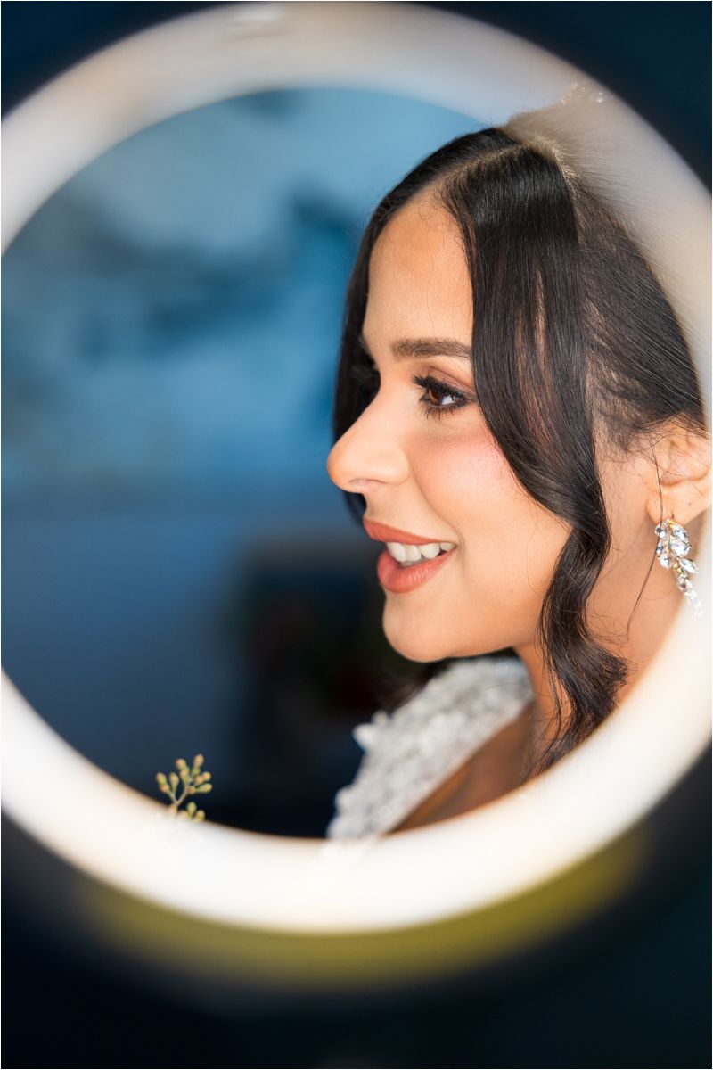 Artistic bridal portrait series through circular mirror reflections showing elegant profile views and soft smiles.