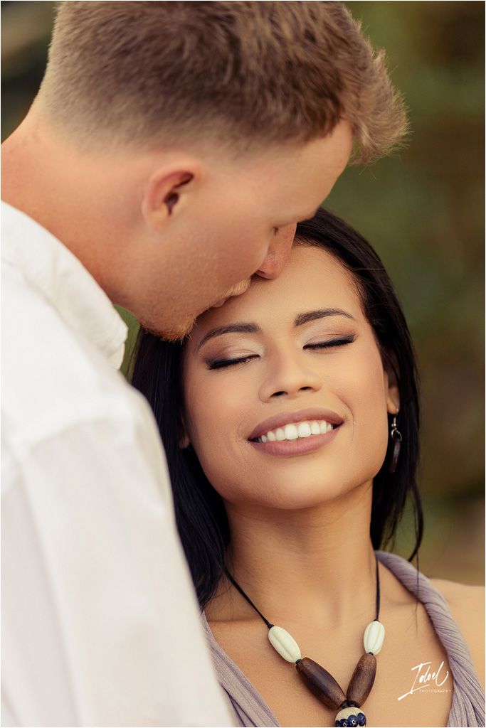 Intimate closeup of tender moment with natural lighting.