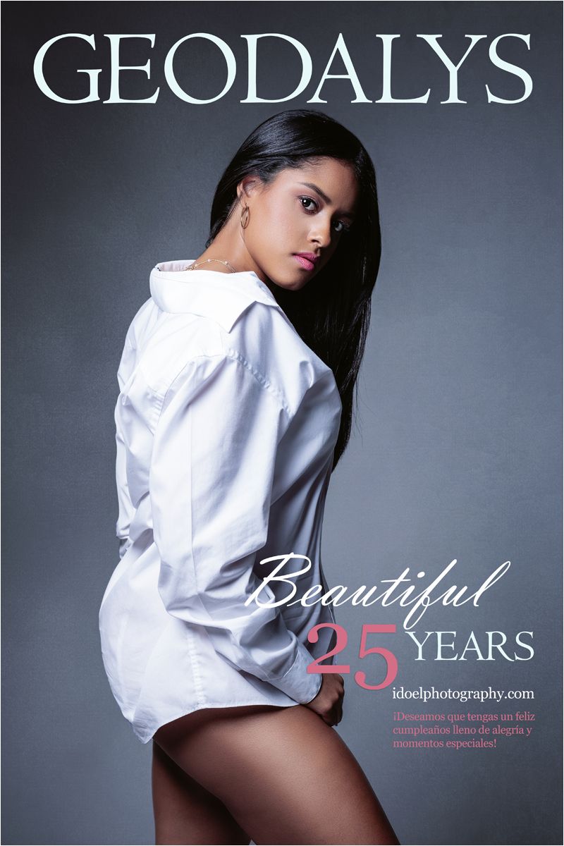 Fashion model in white button-down shirt poses against gray background for Geodalys 25th anniversary photo.