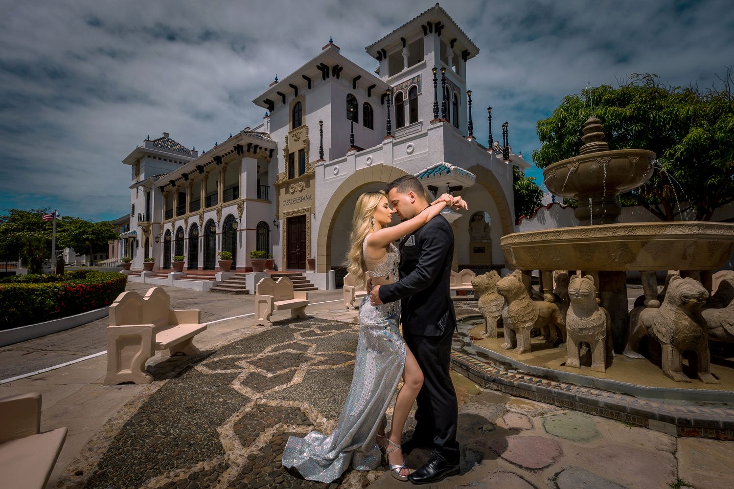 Wedding photography session at a historic building with dramatic architectural features.