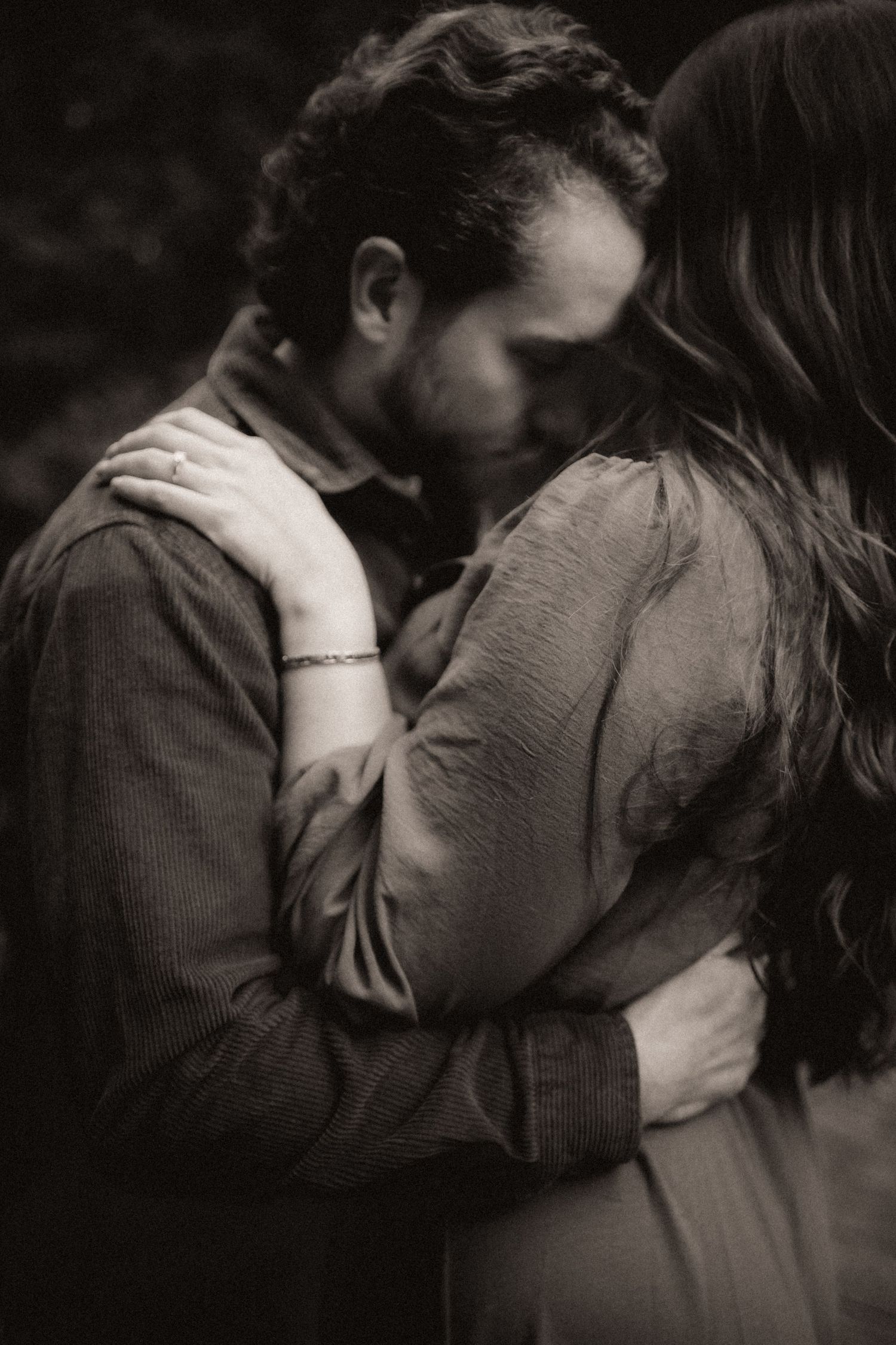 Black and white series of romantic couple portraits showing tender moments.