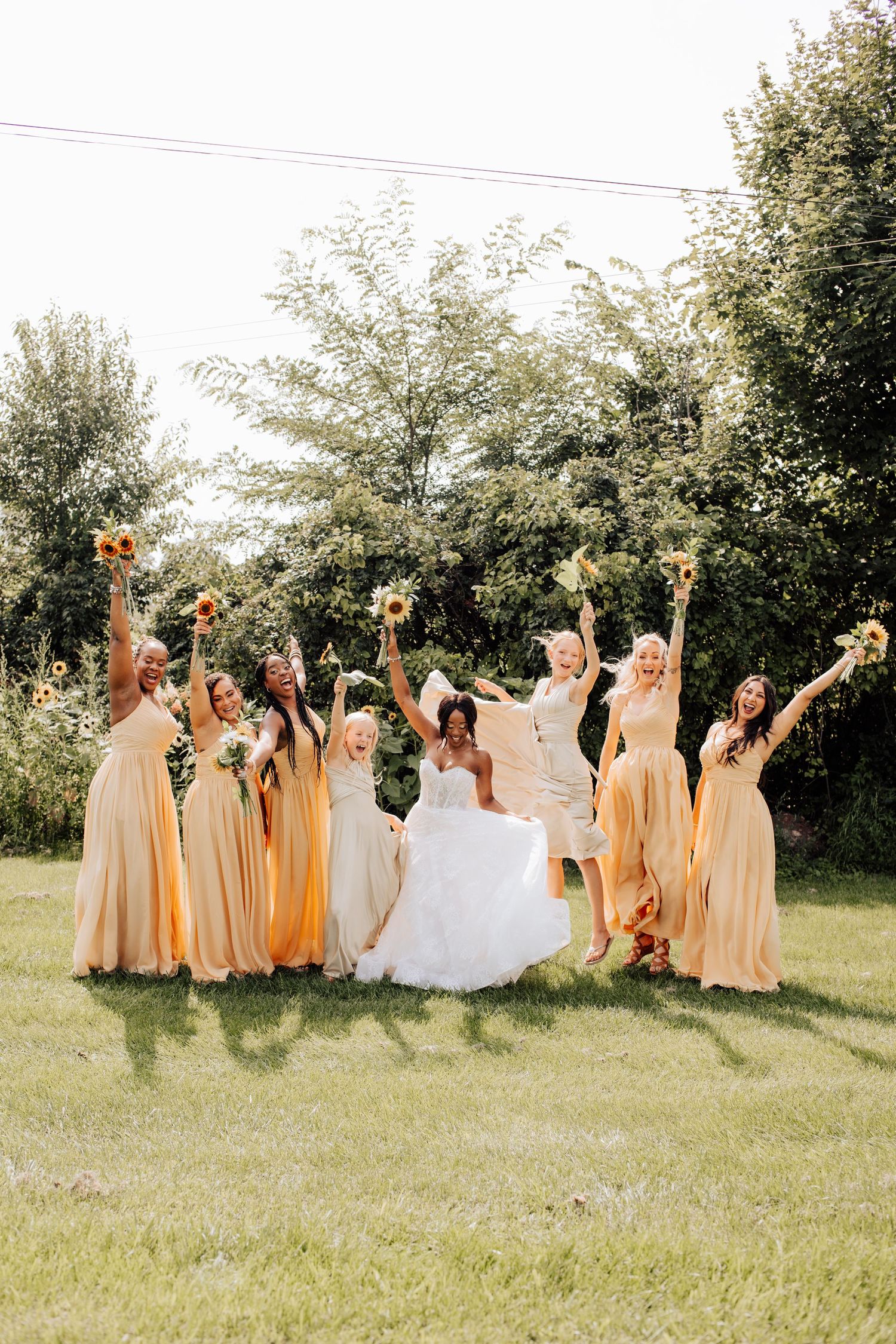 Bridal party in yellow dresses poses candidly in Madoc, Ontario