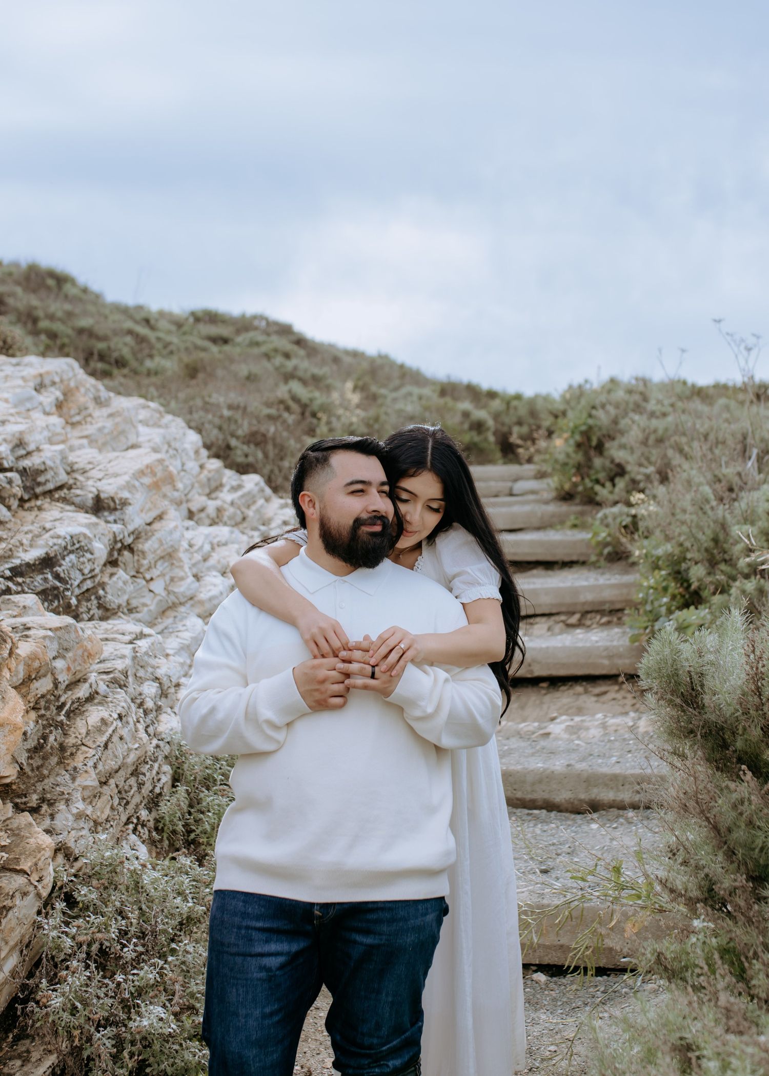 Jose and Sheila embracing in morro bay california