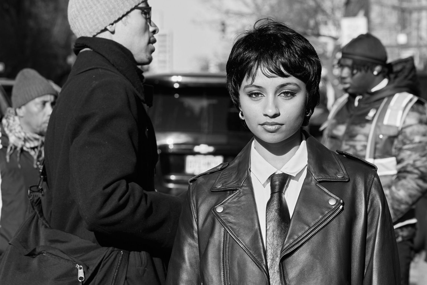 Black and white portrait of fashion model backstage during runway event