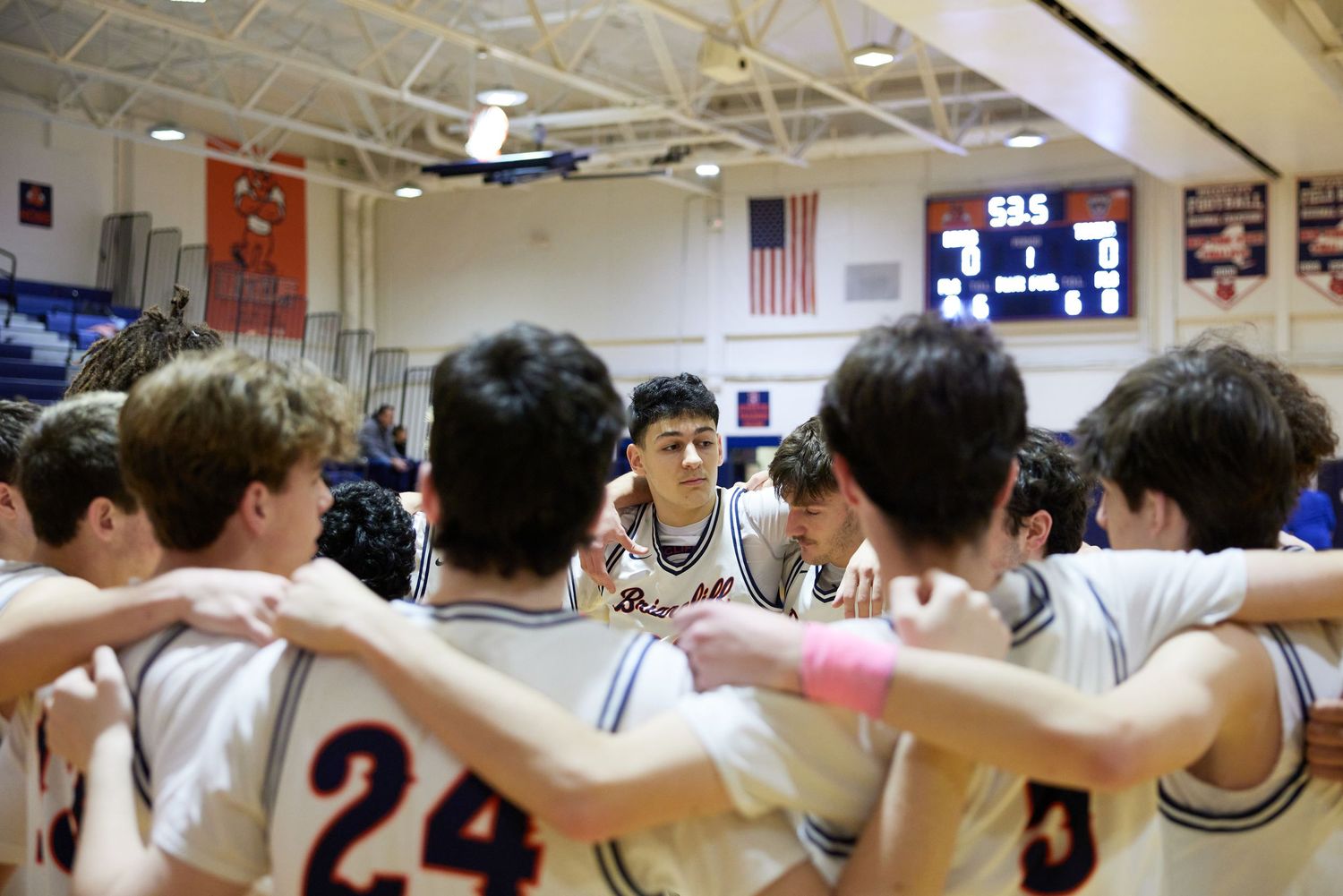 Briarcliff Manor Boys Varsity basketball team pre-game huddle