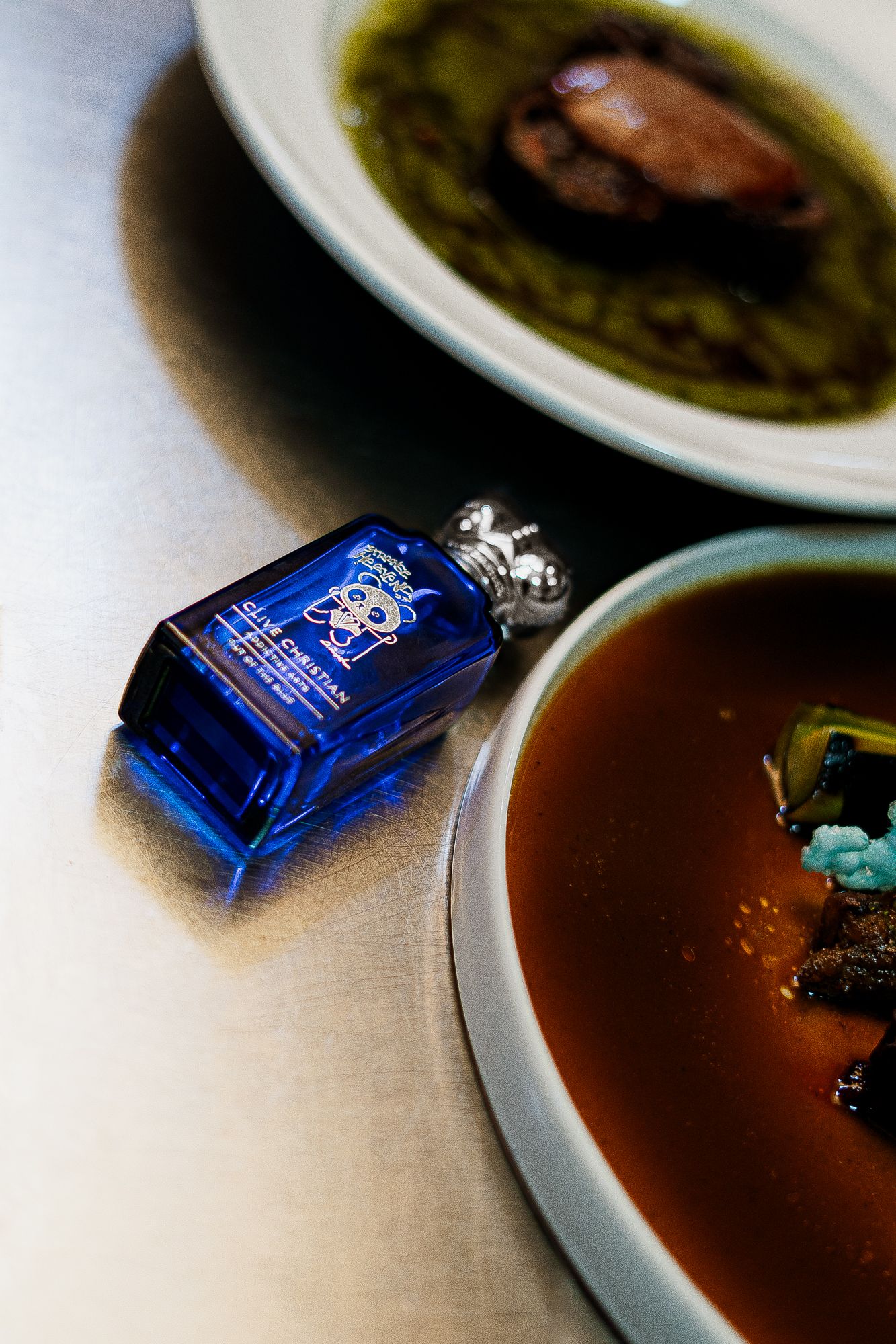 product shoot with clive christain perfume, photographed by Anny Productions Photography.