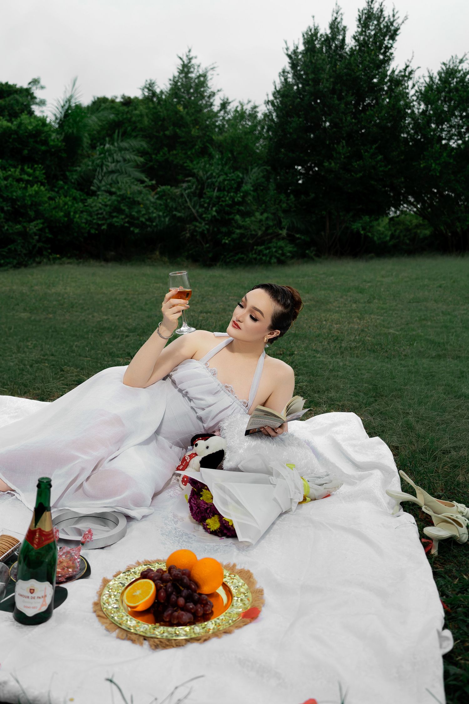 Female portrait photoshoot on a picnic set up, photographed by Anny Productions Photography.