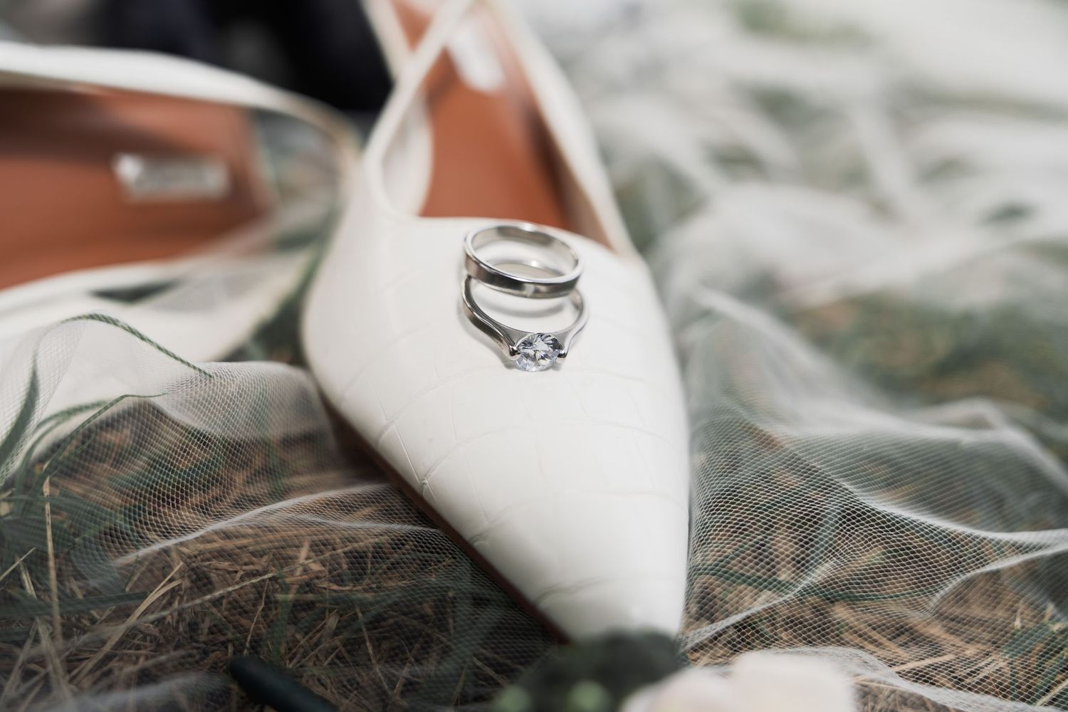 detail wedding ring photo with the bride shoe, photographed by Anny Productions Photography.