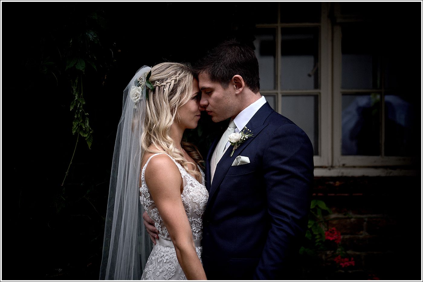 A romantic wedding couple shares intimate moments in black and white photos arranged in a sequence.