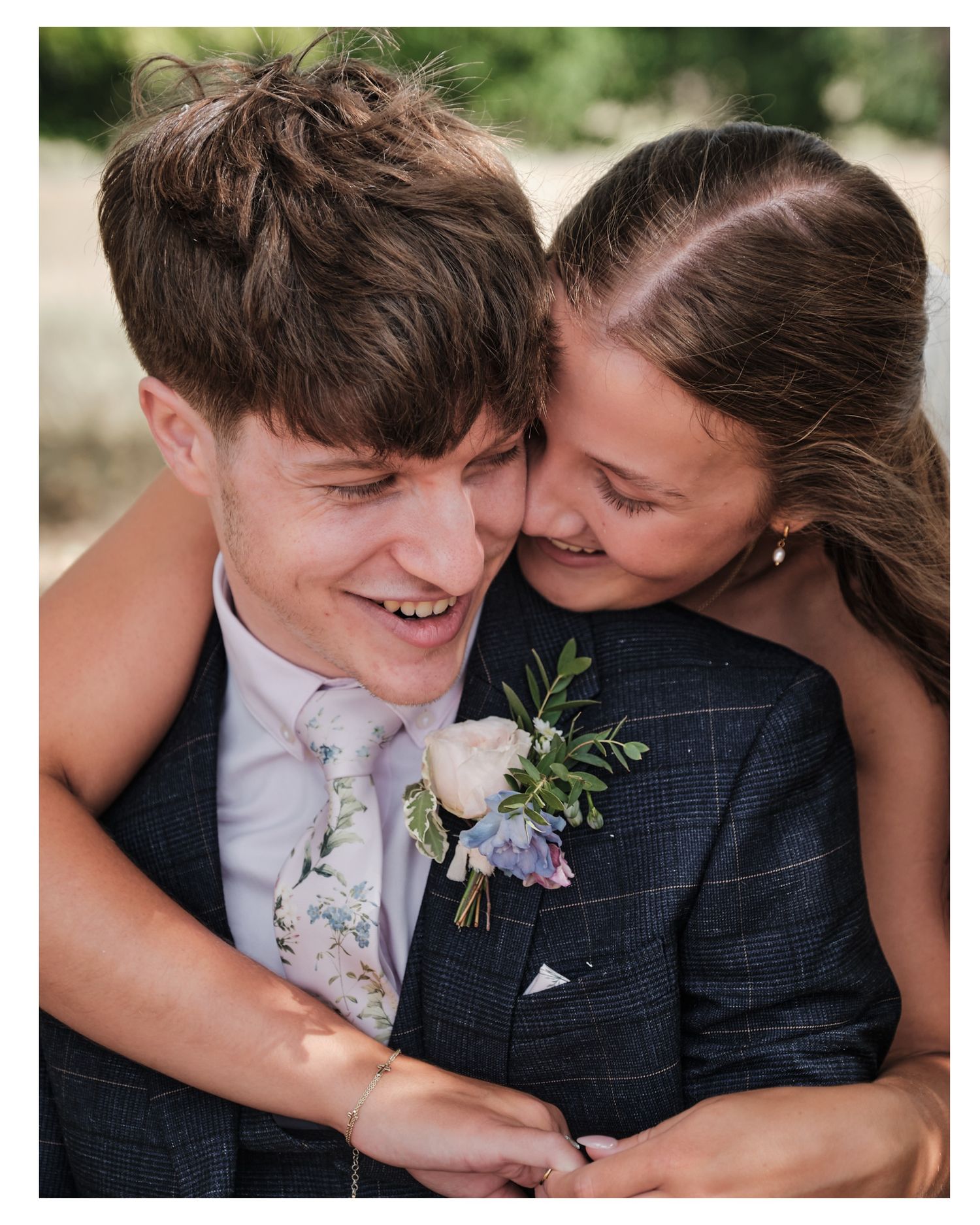 A couple shares intimate moments in a series of romantic wedding photos with natural outdoor lighting.
