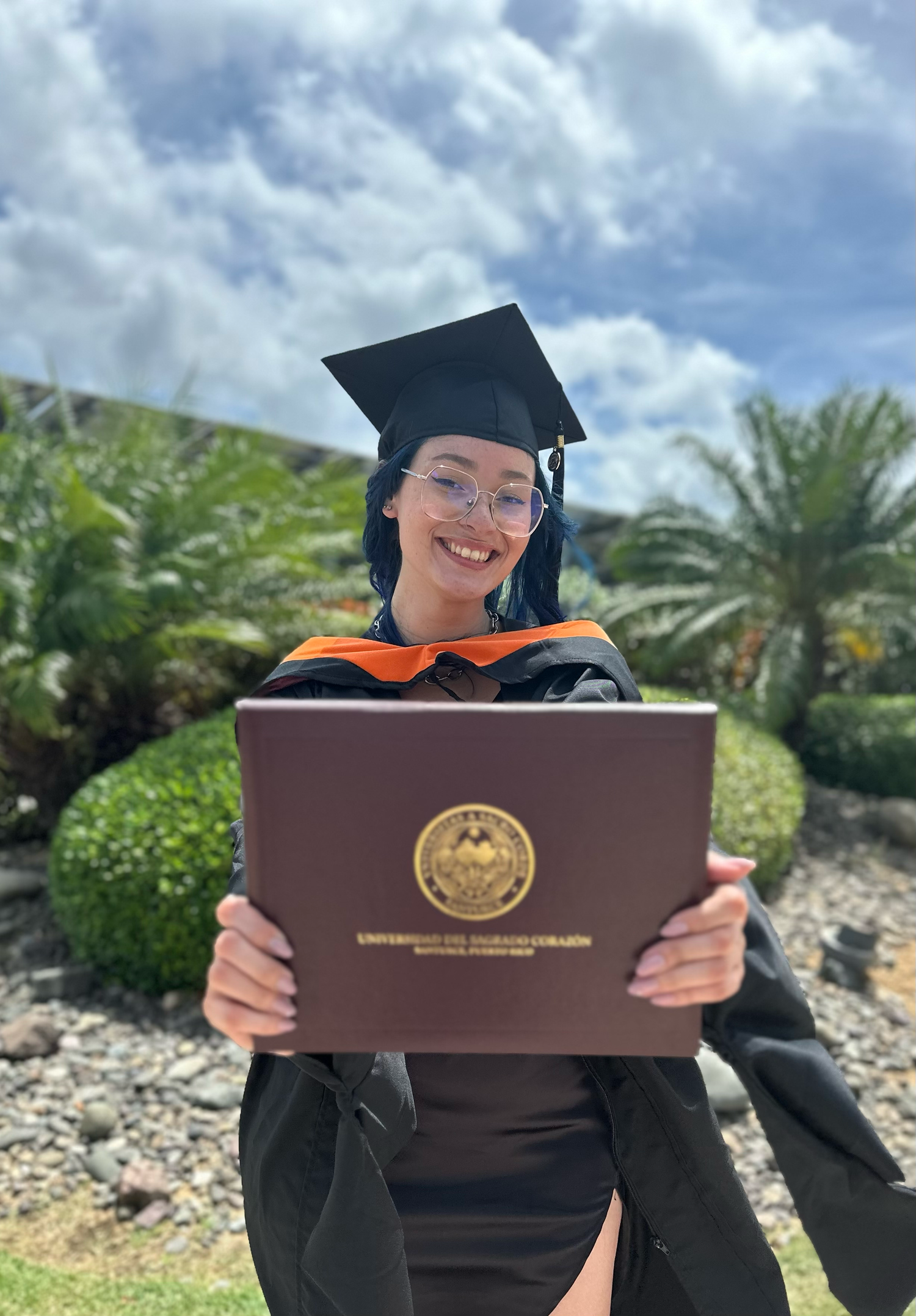 Photo of me the day of my Master's Graduation.