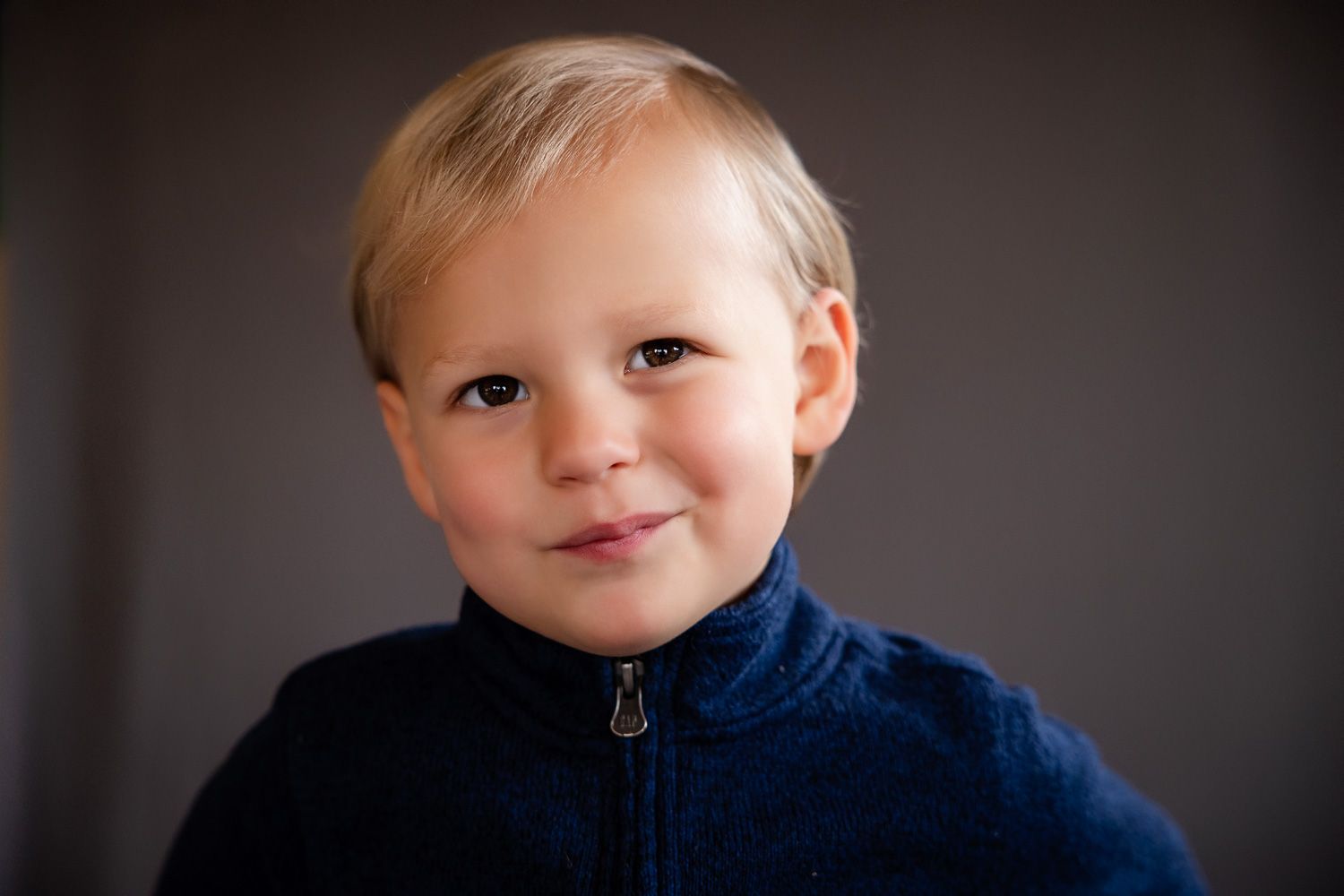 Boy looks inquisitive at his preschool portrait session with Bay Area Photographer Cindy Tucey
