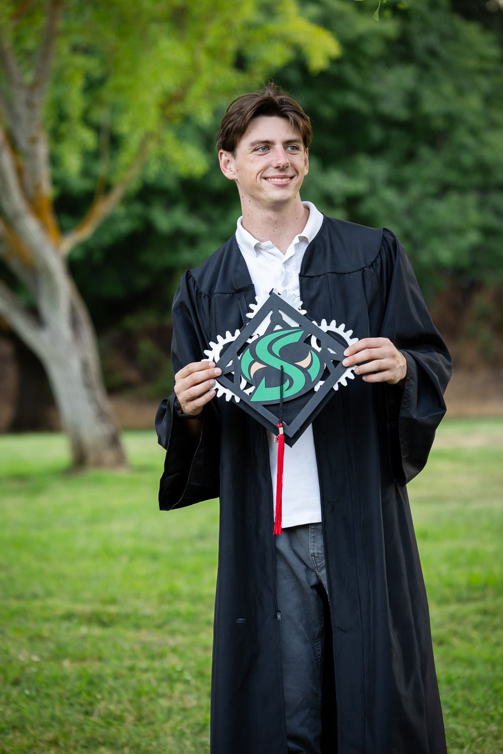 Bay Area senior poses at Vasona Lake in Los Gatos for his senior photography session with Cindy Tucey Photography