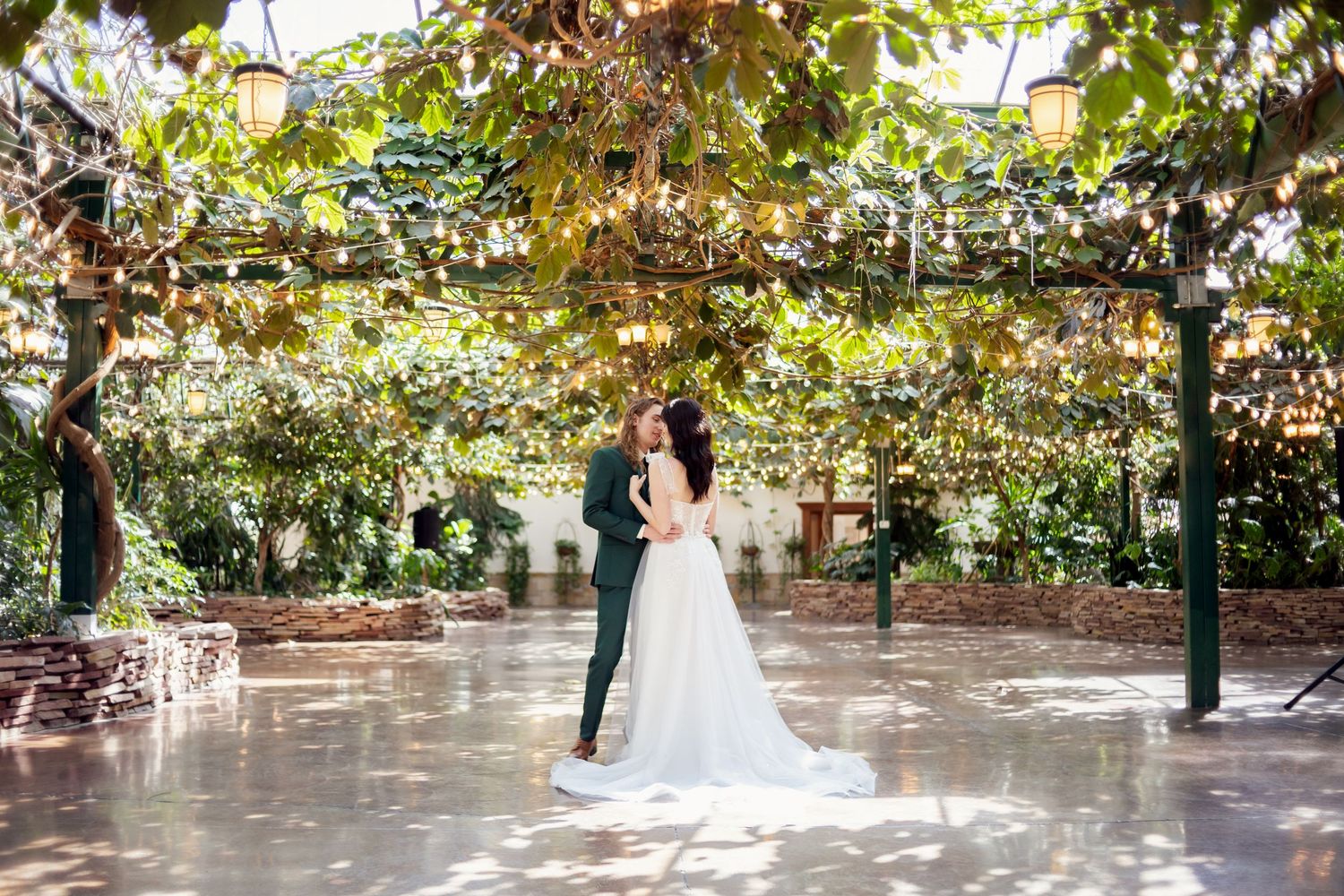 timeless bride and group dancing on empty dance floor