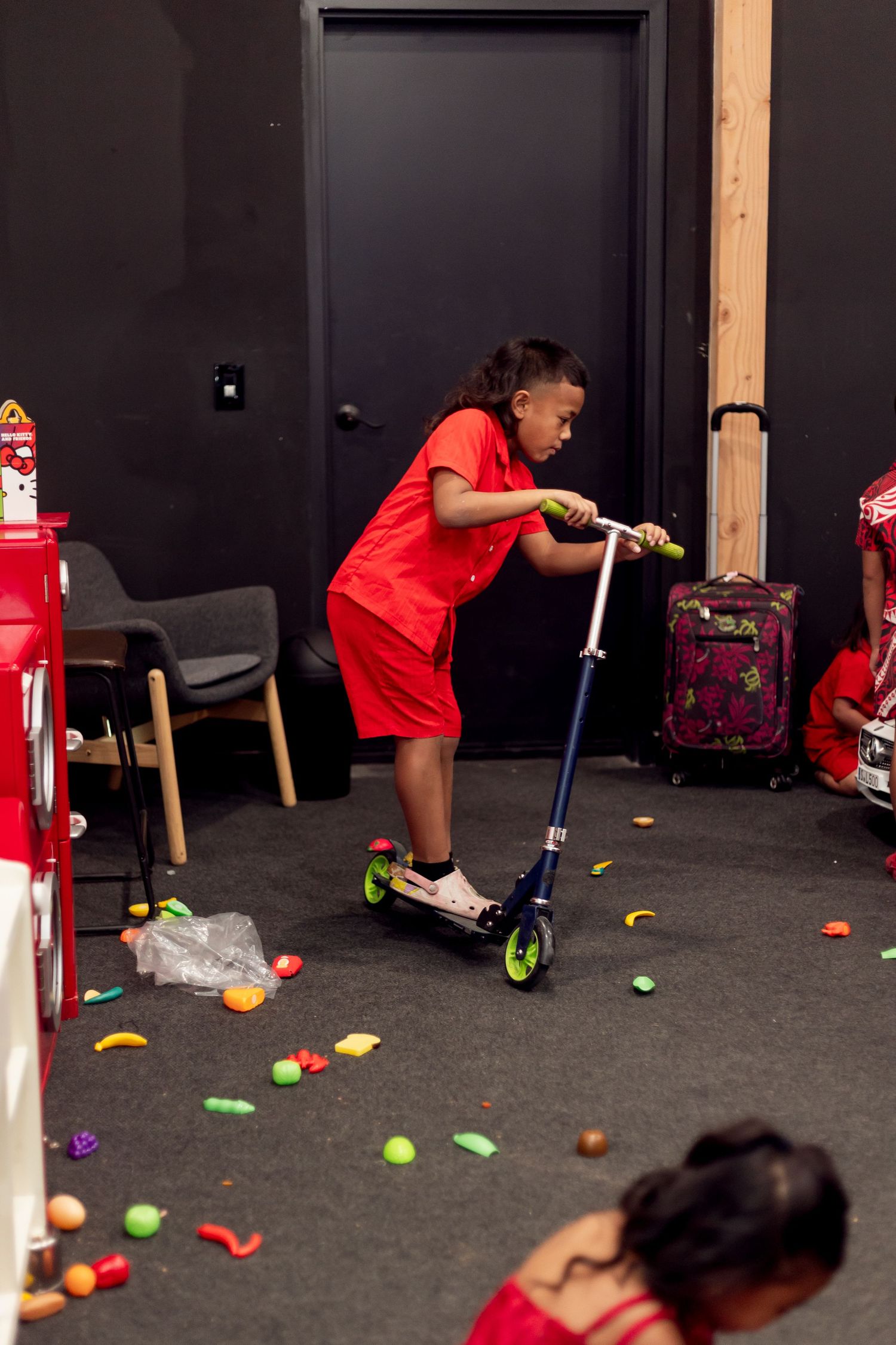 kid playing in playroom at wedding reception