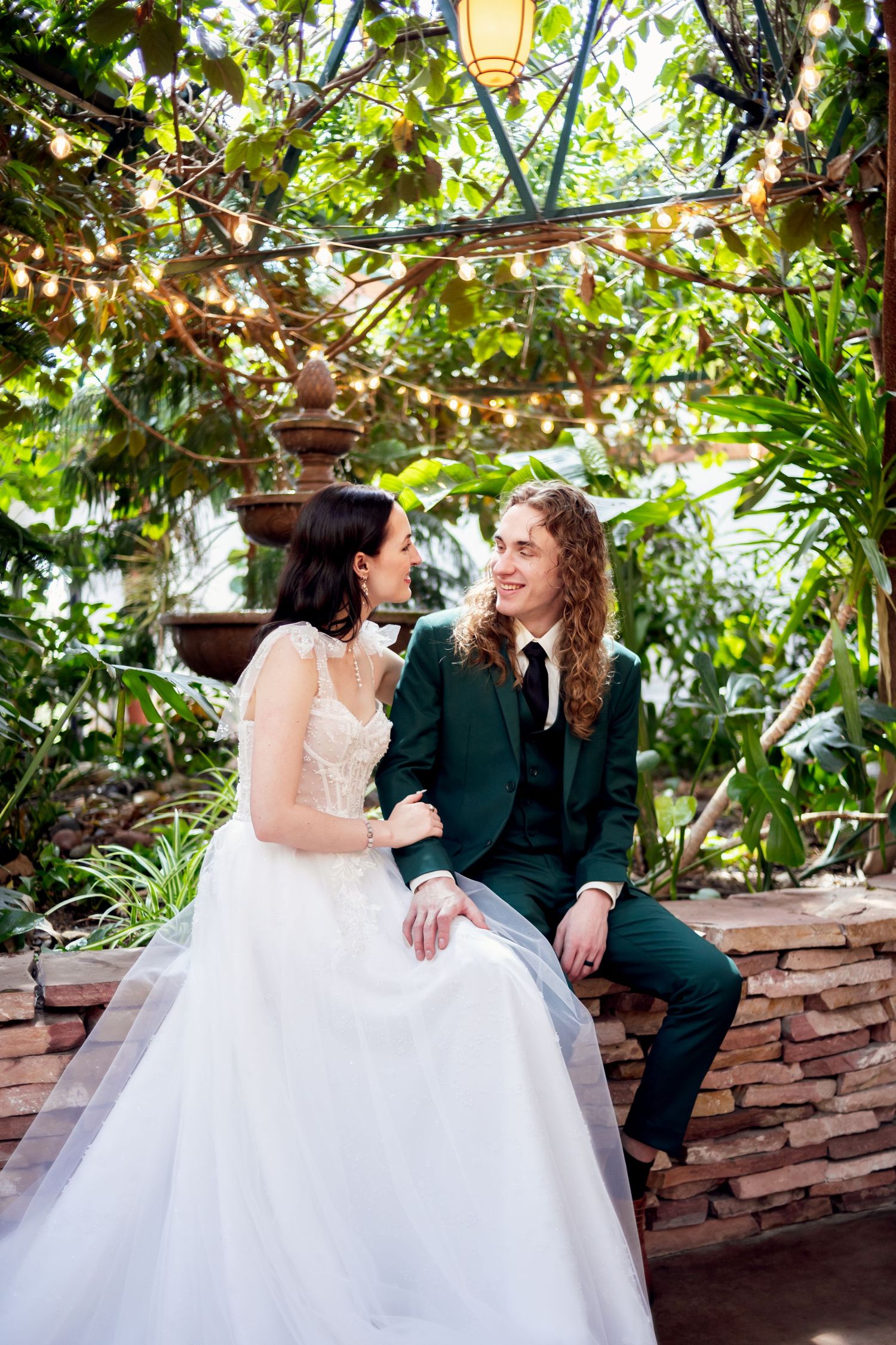 elegant bride and groom talking candidly at missouri wedding venue
