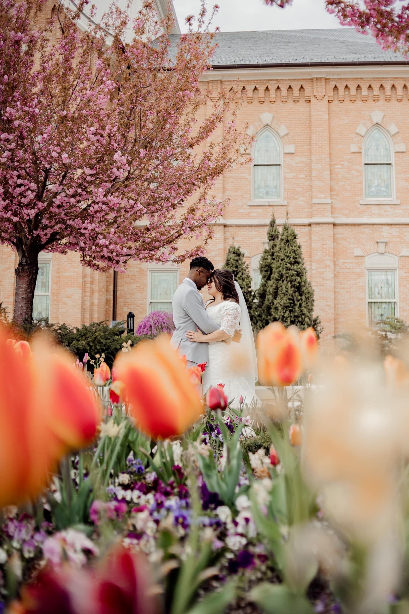 couple embracing sweetly at lds temple sealing in missouri