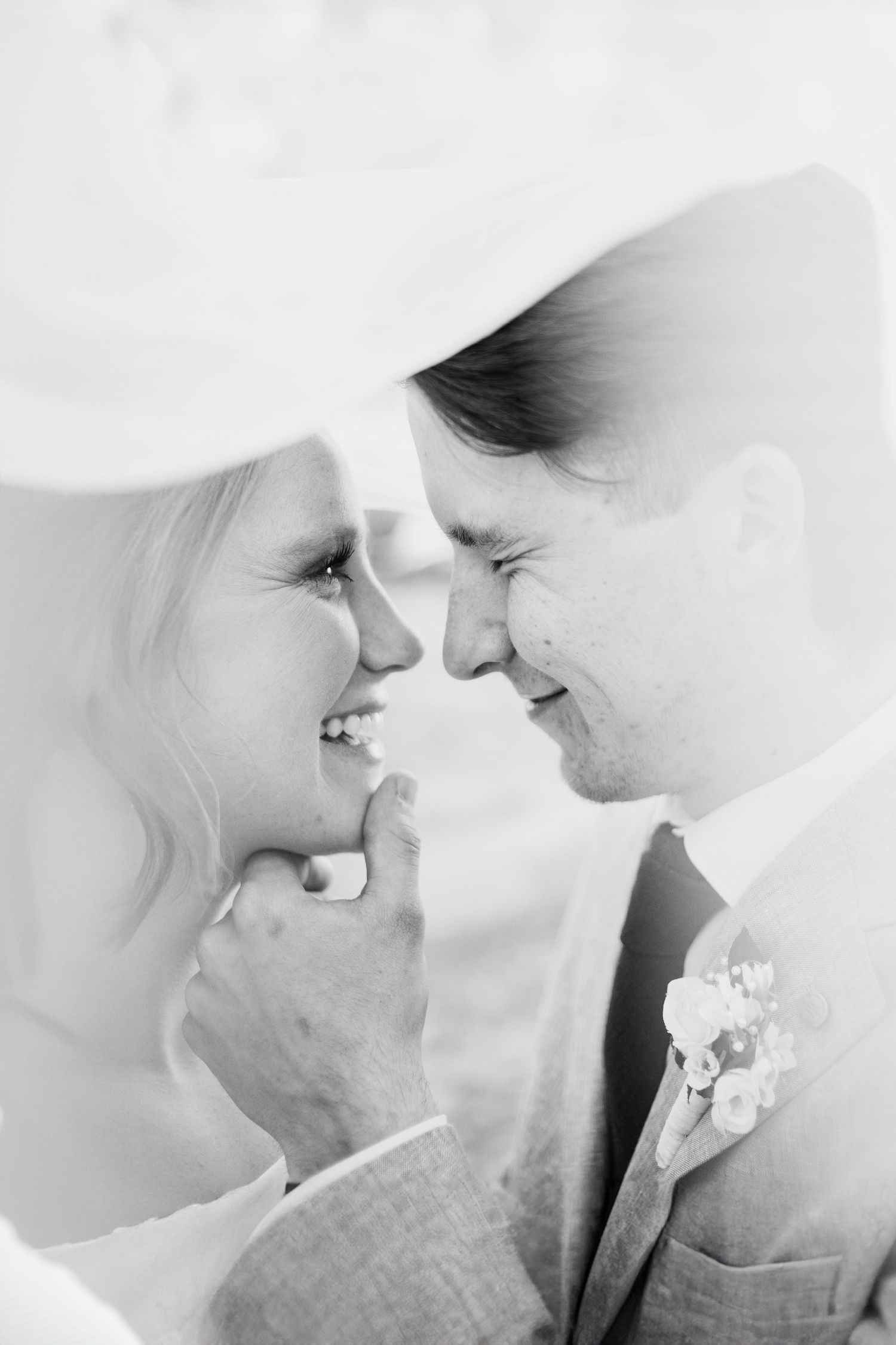 couple laughing candidly at kcmo wedding