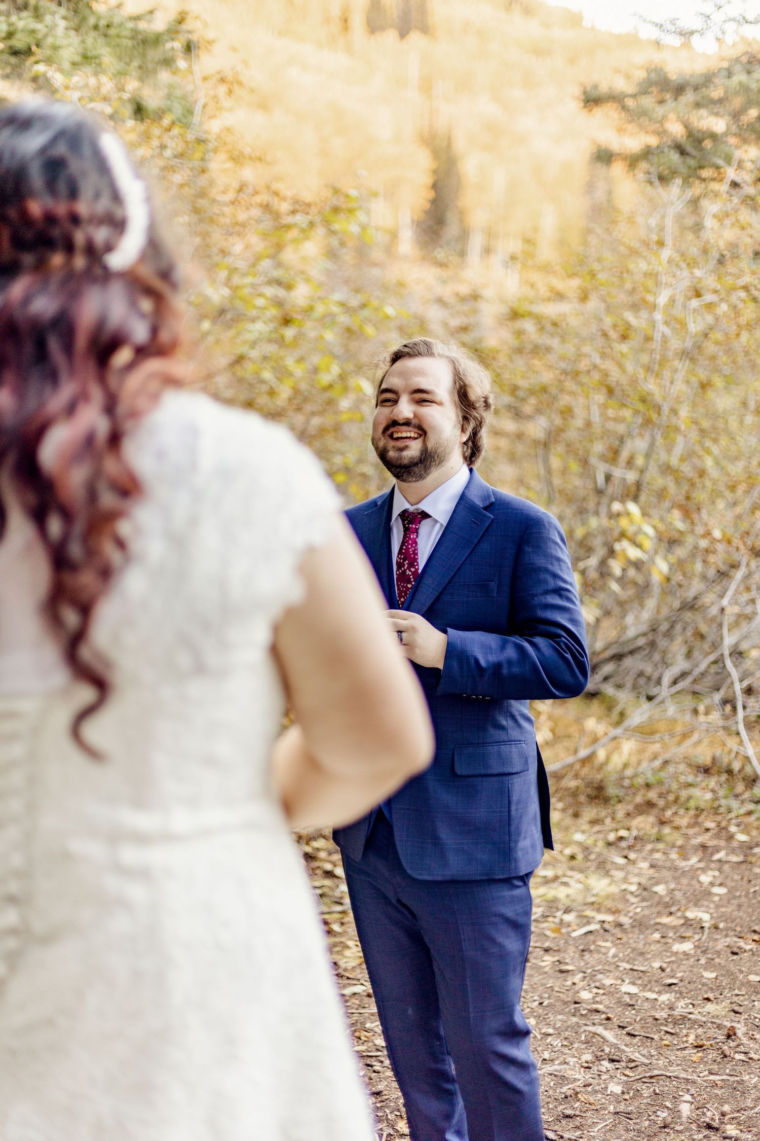 joyful first look between bride and groom before outdoor missouri wedding