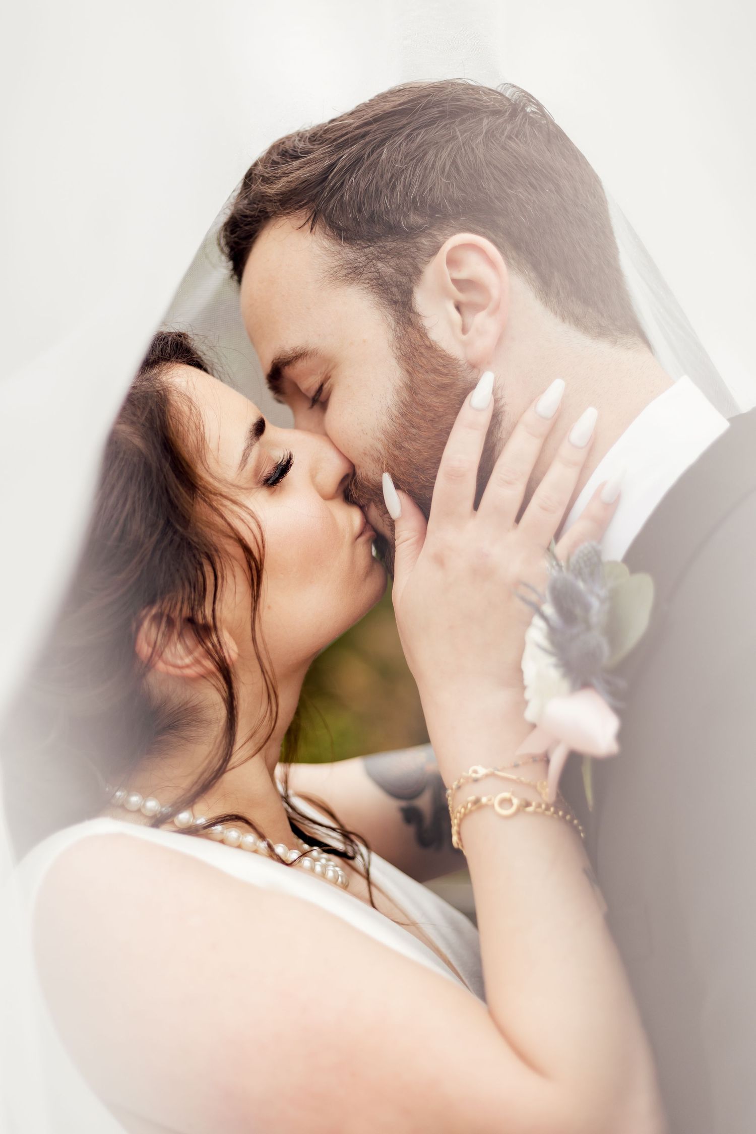 intimate kiss between bride and groom at kansas city missouri wedding