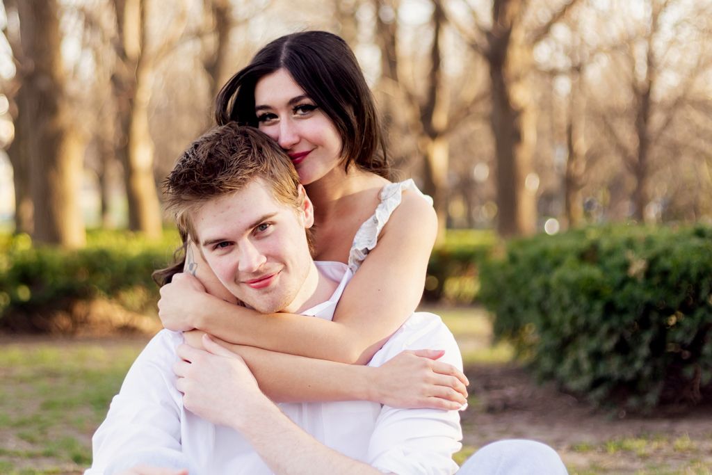 Young couple hugging at the  Nelson-Atkins Museum of Art in Kansas City