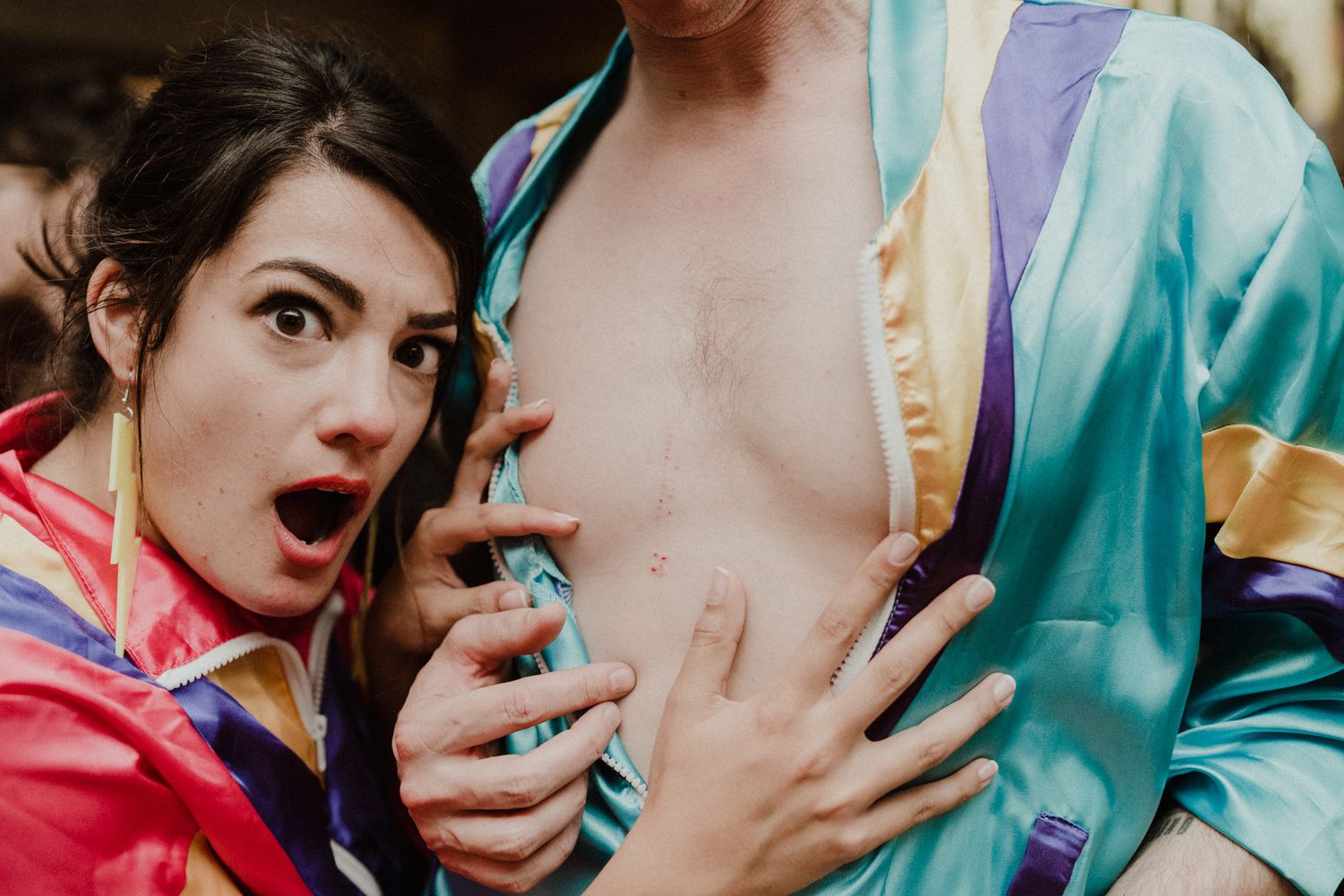 Fun wedding morning with bride and groom in robes — alternative wedding photography in Switzerland by a Portugal Wedding Photographers