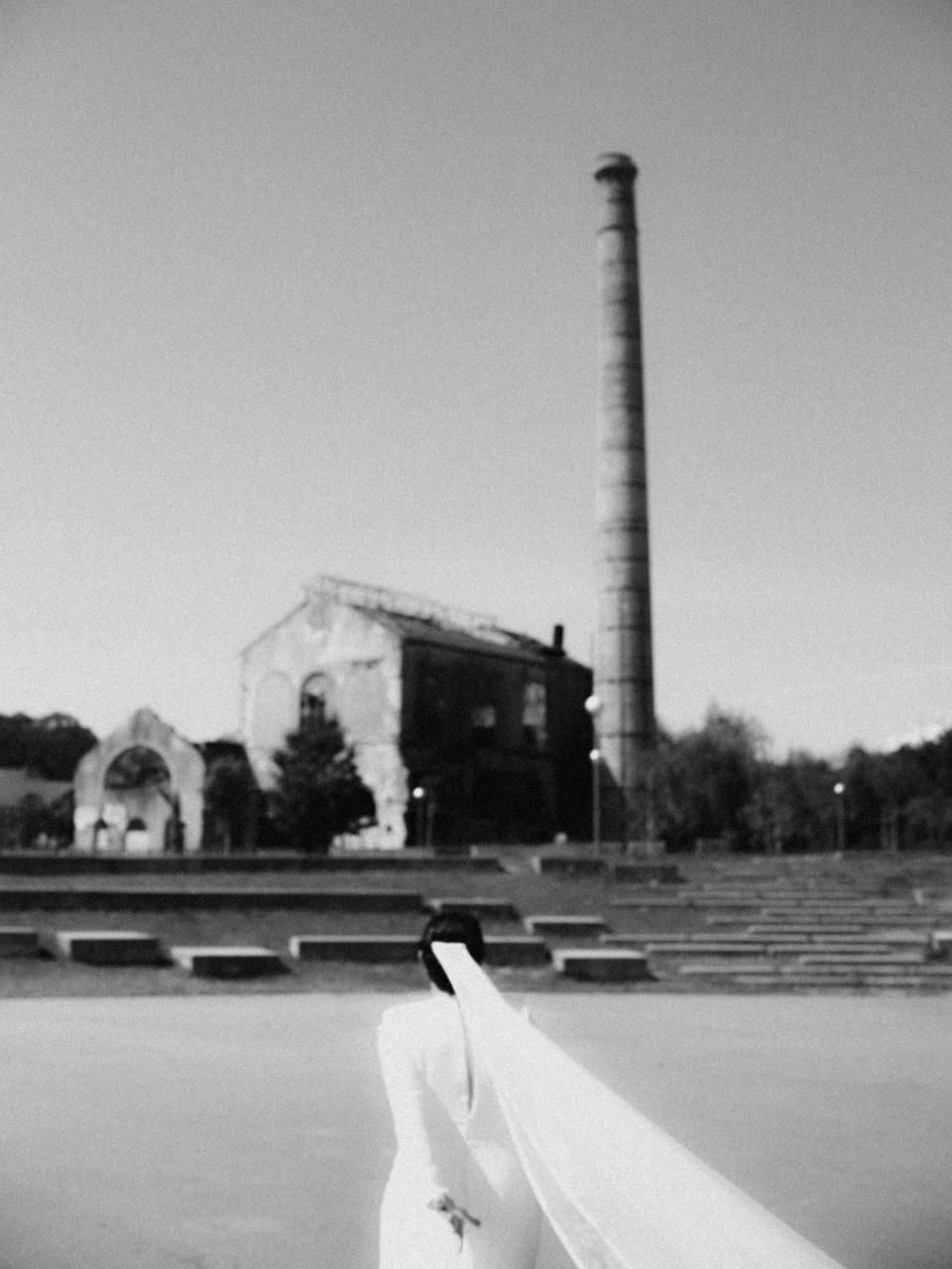 bride walking industrial wedding location portugal