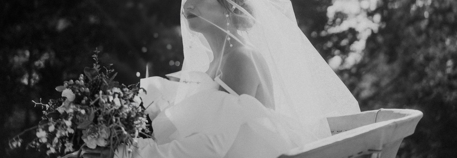 Bride under veil in soft backlight — artistic wedding photo in Portugal by cinematic and alternative wedding photographer.