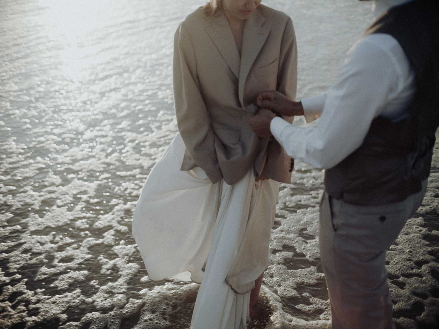 wedding day detail on the beach in lisbon portugal