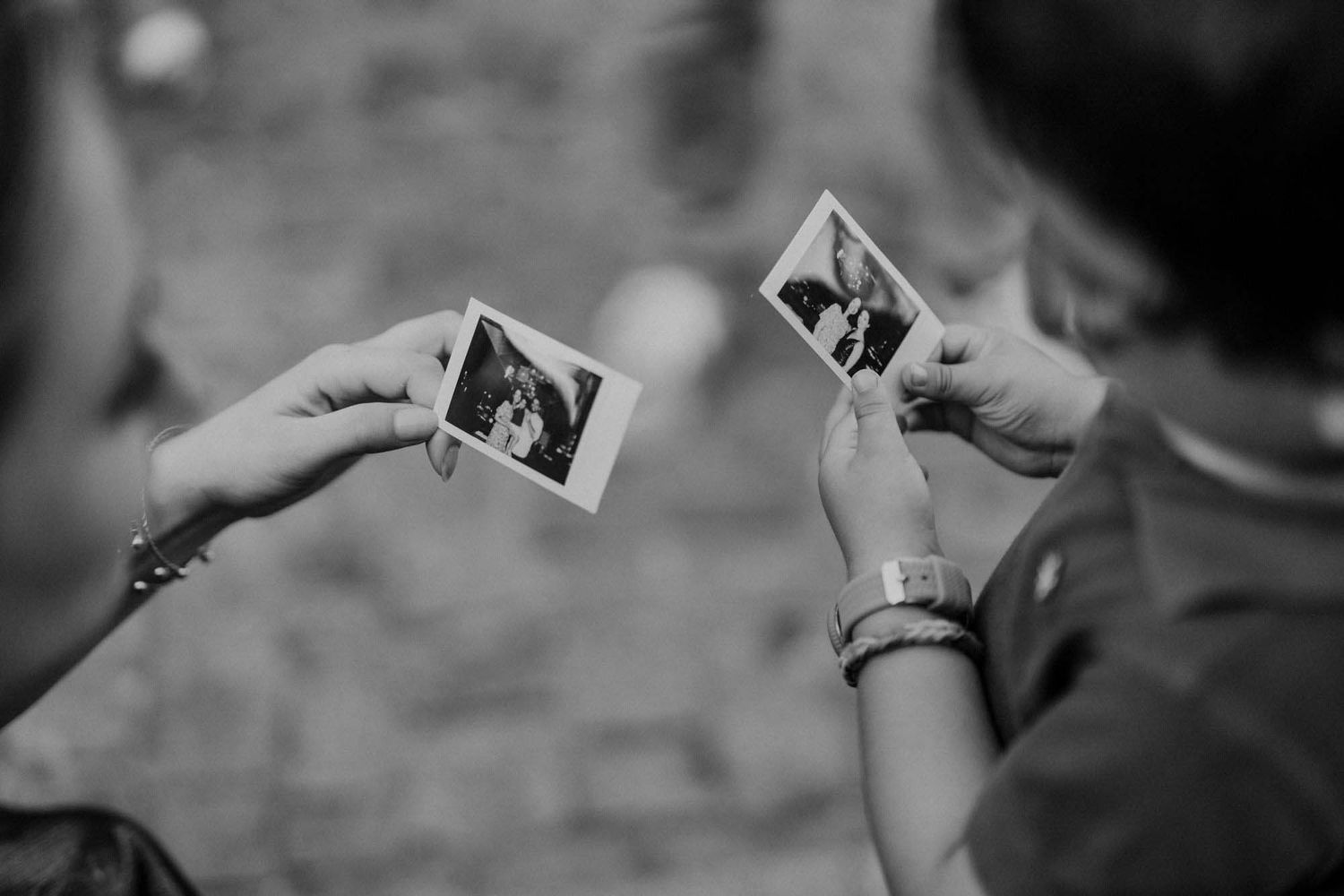 wedding guests sharing instant photos at quinta da eira wedding portugal