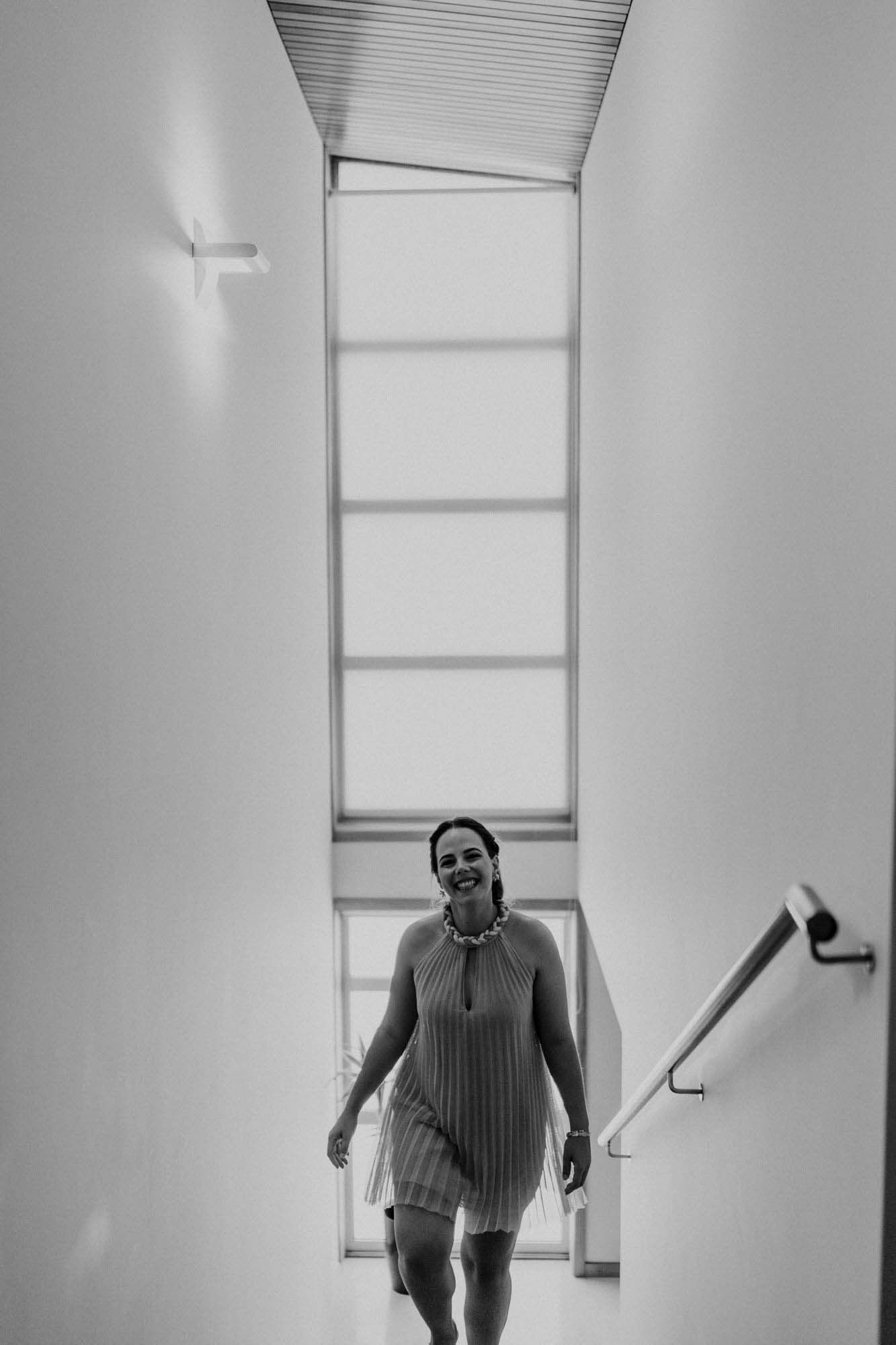 bride walking down stairs during wedding day in portugal
