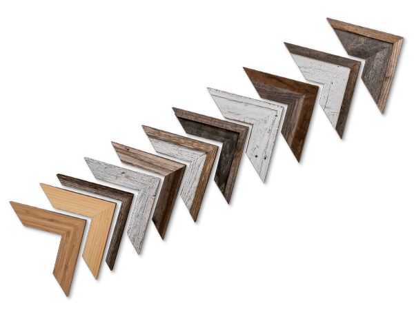A row of triangular wooden frame corner samples arranged in ascending order showing different finishes and styles.
