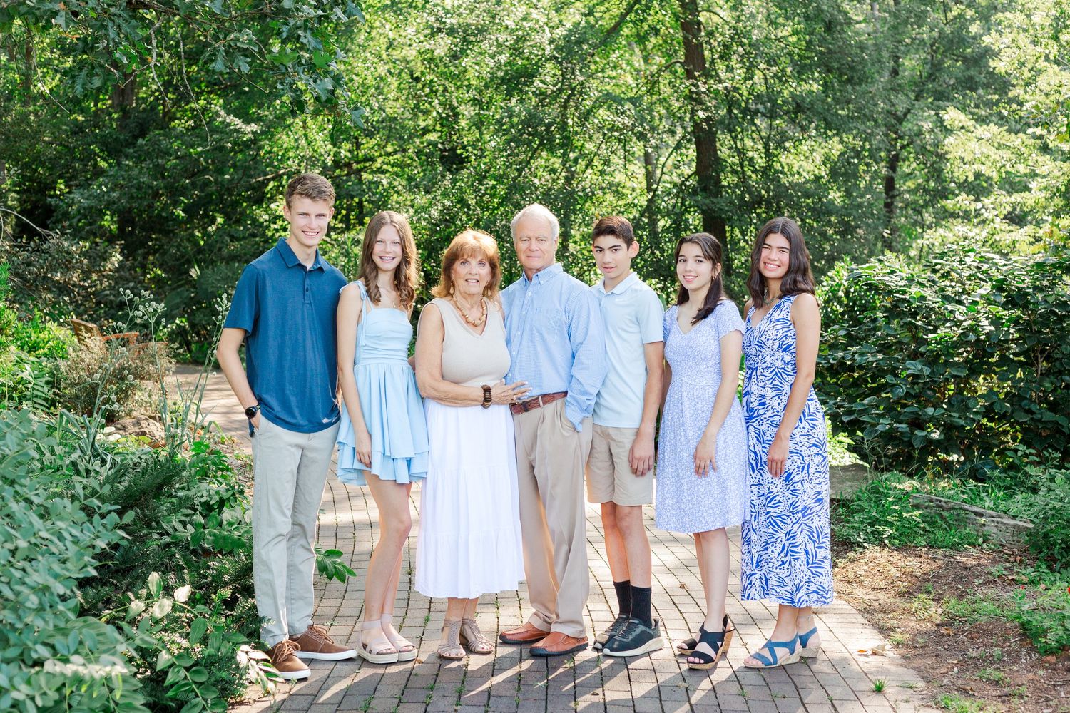 A family poses together for their extended family photos at the Botanical Gardens in Clemson, SC