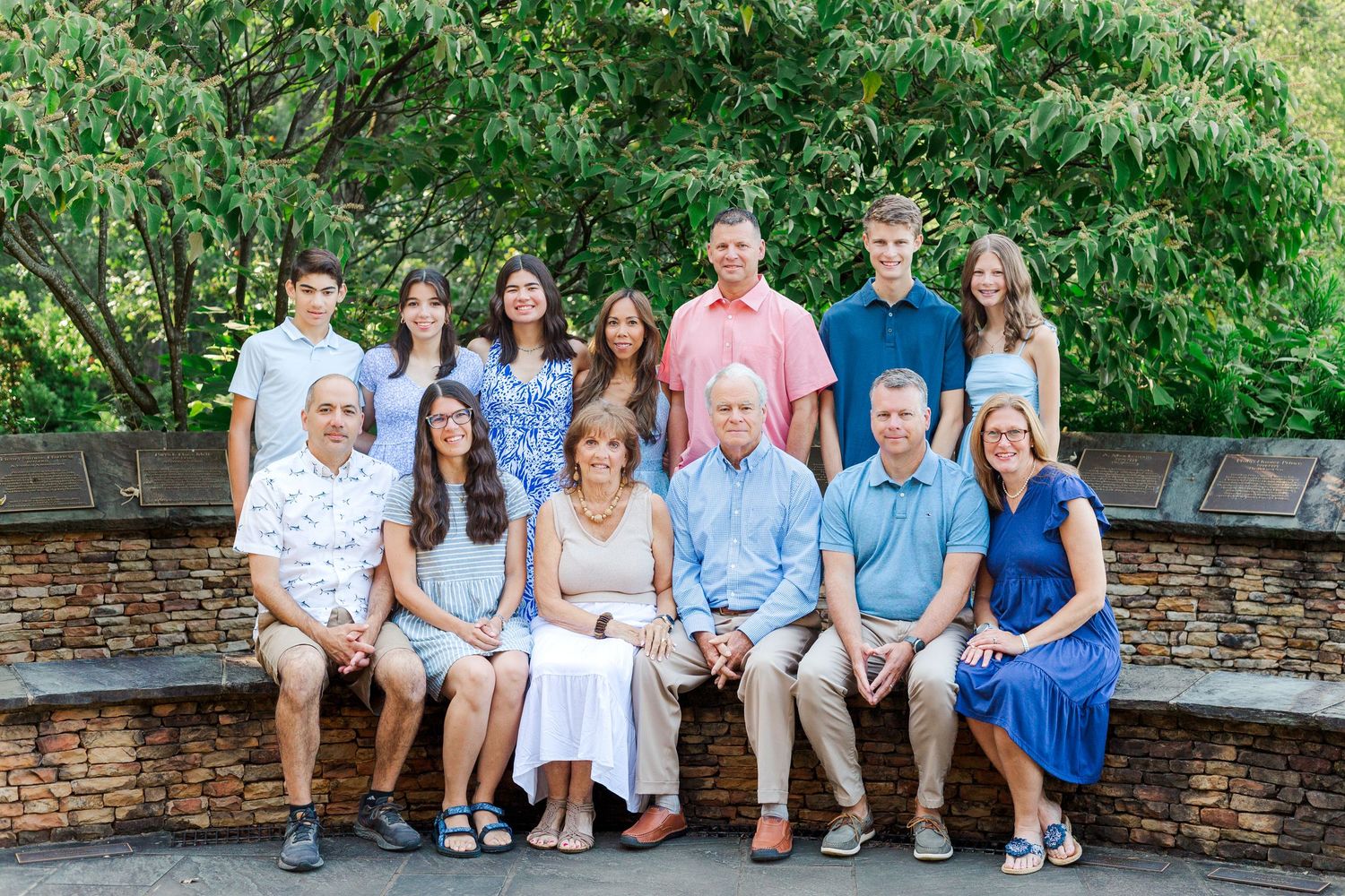 An extended family gathers for a their photos at the Botanical Gardens in Clemson, SC