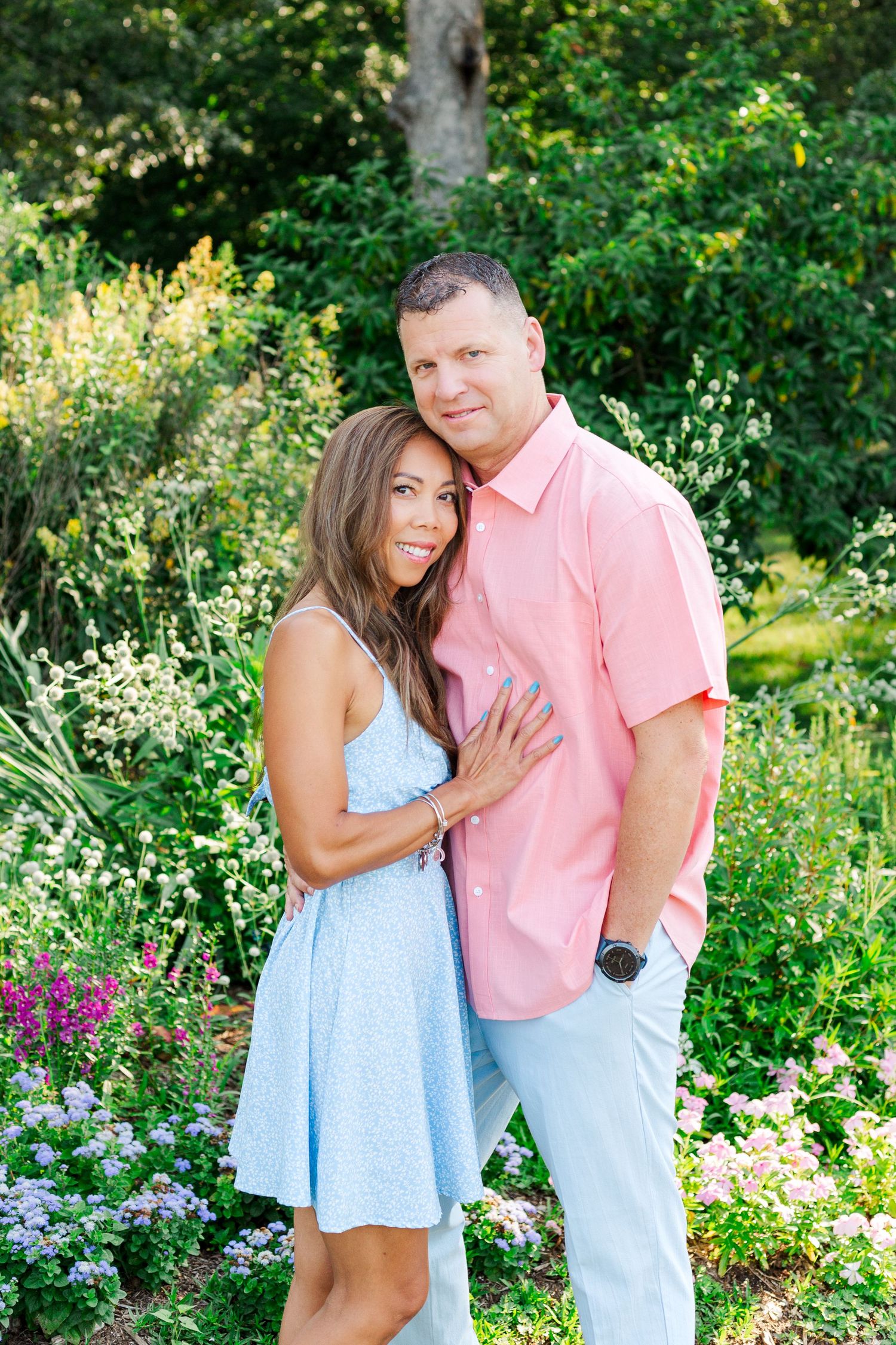A couple poses together for their photo session in the Botanical Gardens in Clemson, SC.