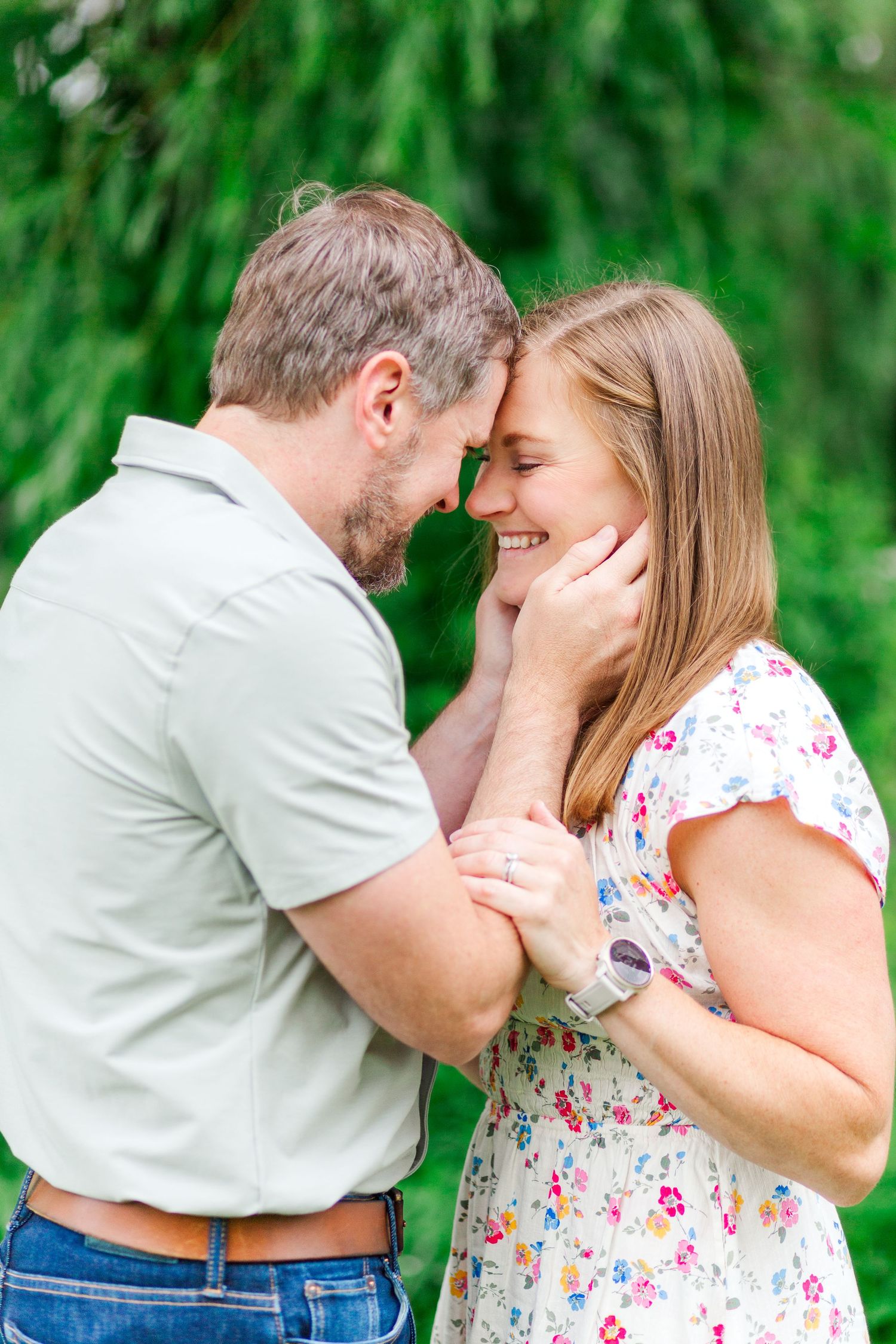 Family moments captured in series against green nature backdrop in Hendersonville, NC taken by a Clemson, SC photographer