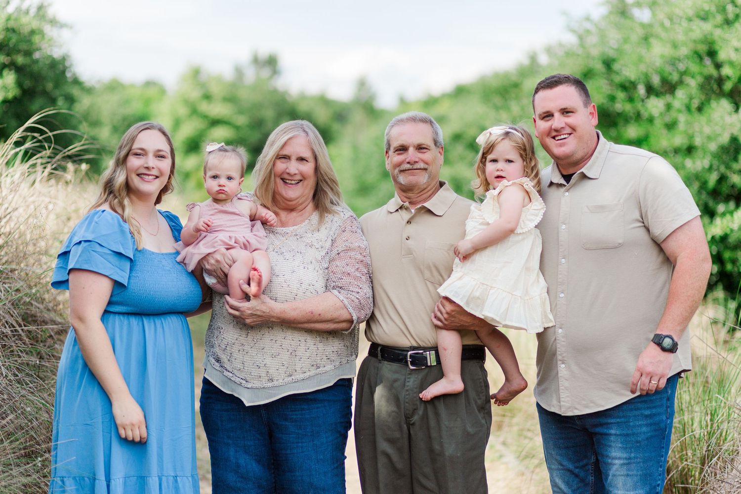 Extended family poses in Clemson, SC together for a phot session