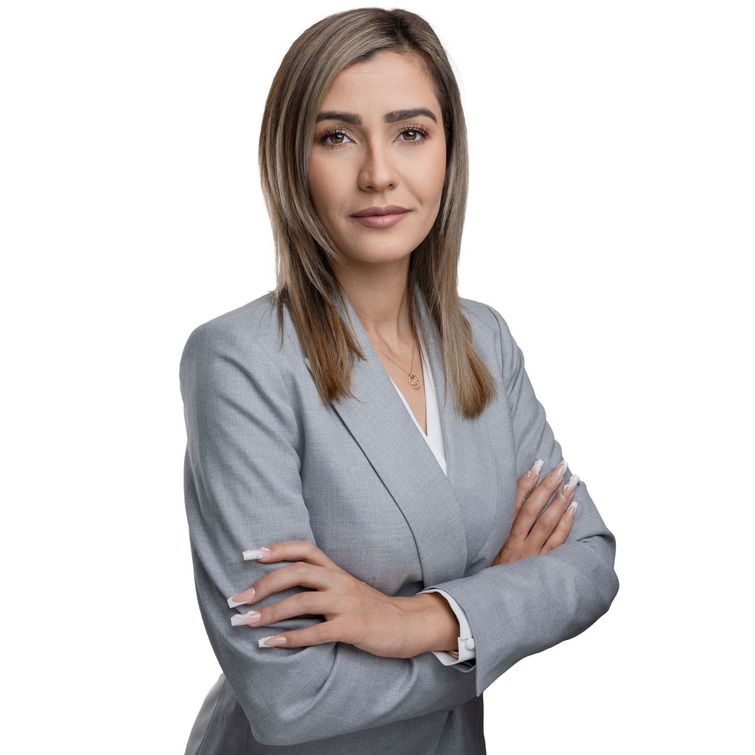 Professional headshots of person in gray business suit against white background.