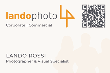 Professional business card design with orange and gray logo for Lando Photo photography services.