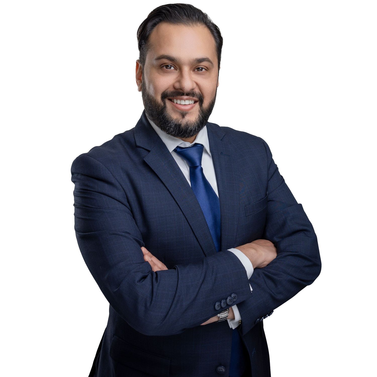 Professional headshots of person in navy suit and tie against neutral background.