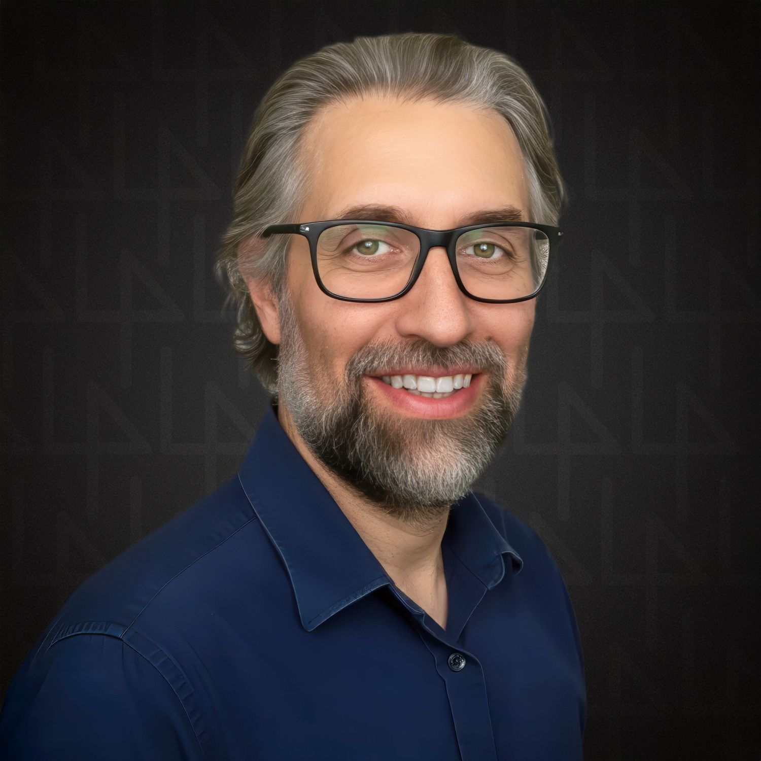 Professional headshot series of a person wearing glasses and a blue shirt against a dark background, showing warm expressions.