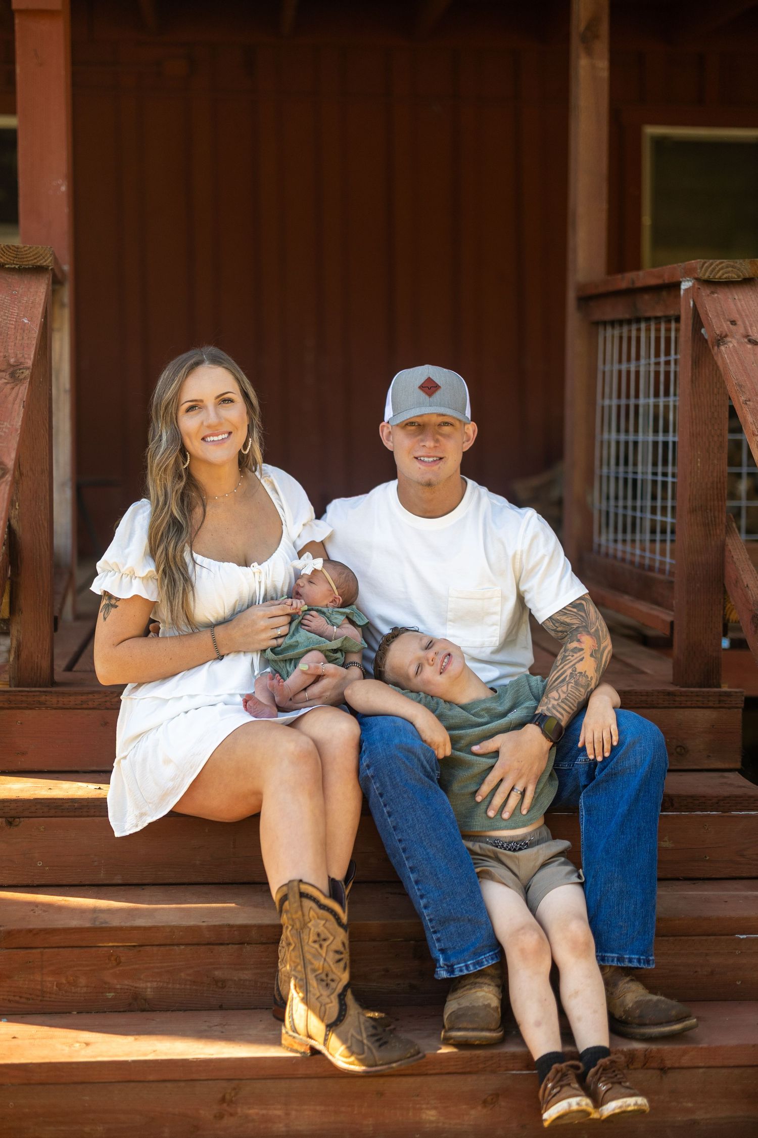 Casual portraits taken on a rustic wooden porch with vintage styling.