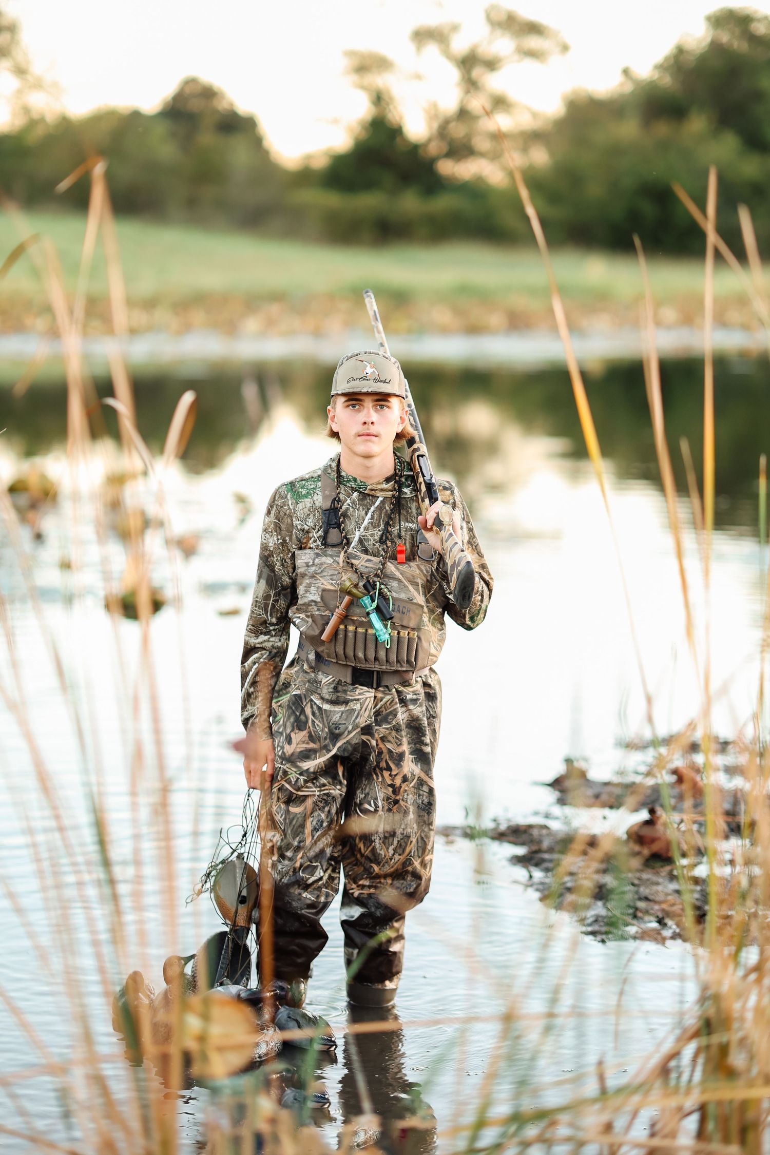 Hunting senior photos featuring timeless, modern portraits captured by a DFW senior photographer in East Texas.