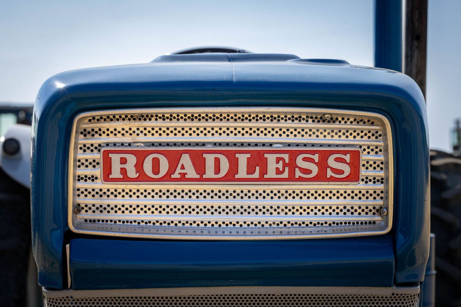 Roadless tractor front grill