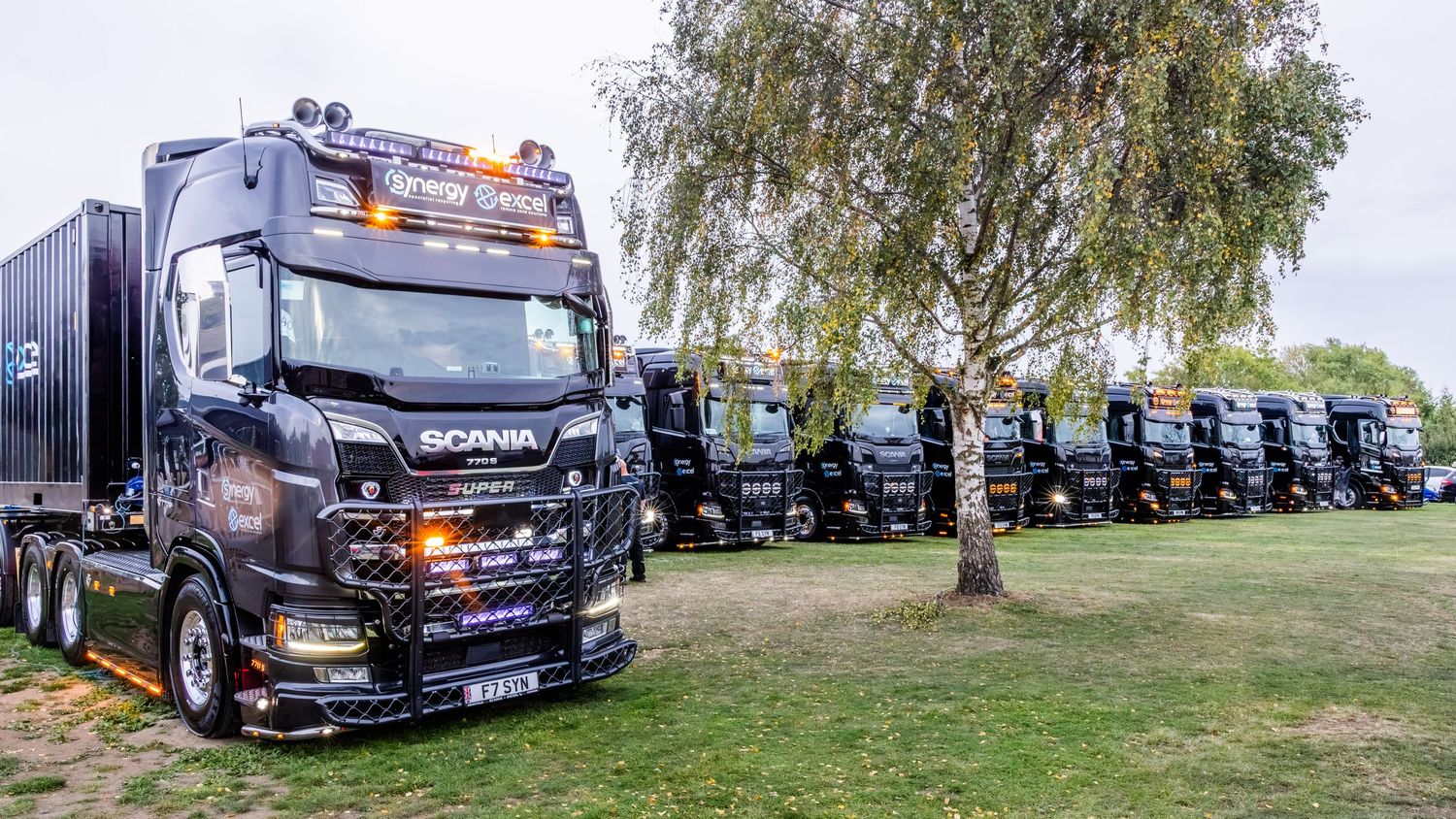 A line up of Scania trucks from Excel at SwedeFest 2026