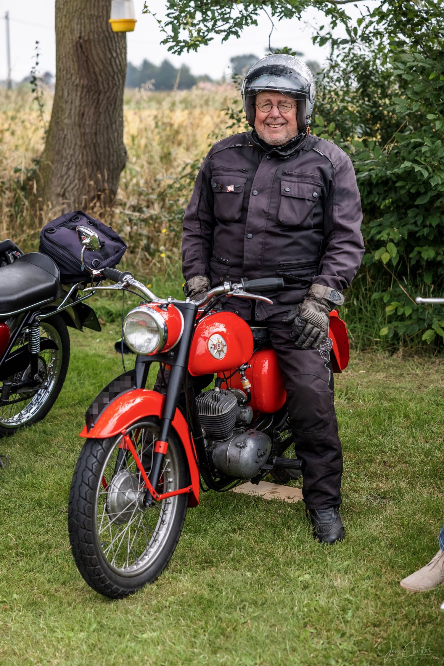 A gentleman on a classic motorcycle