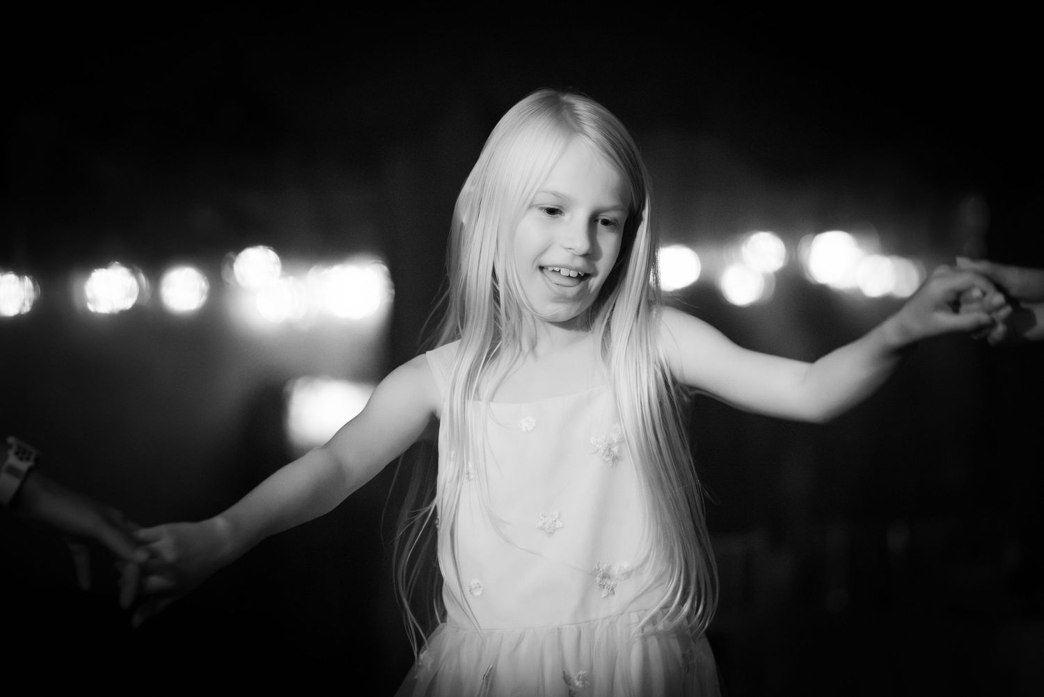 A girl dancing at a wedding reception