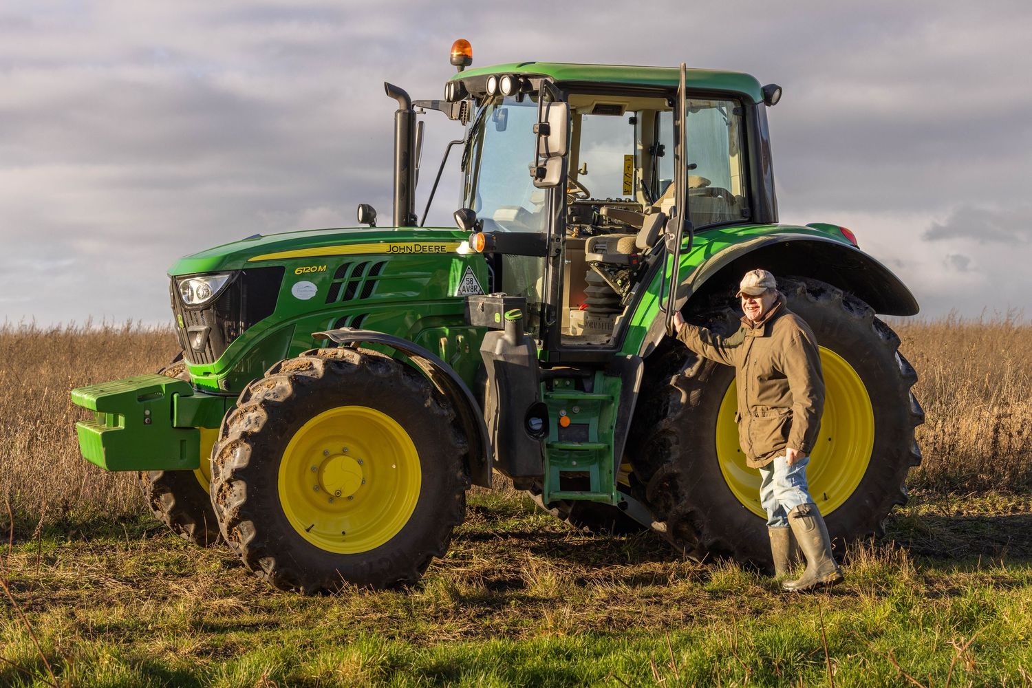 Farmer with John Deere tractor